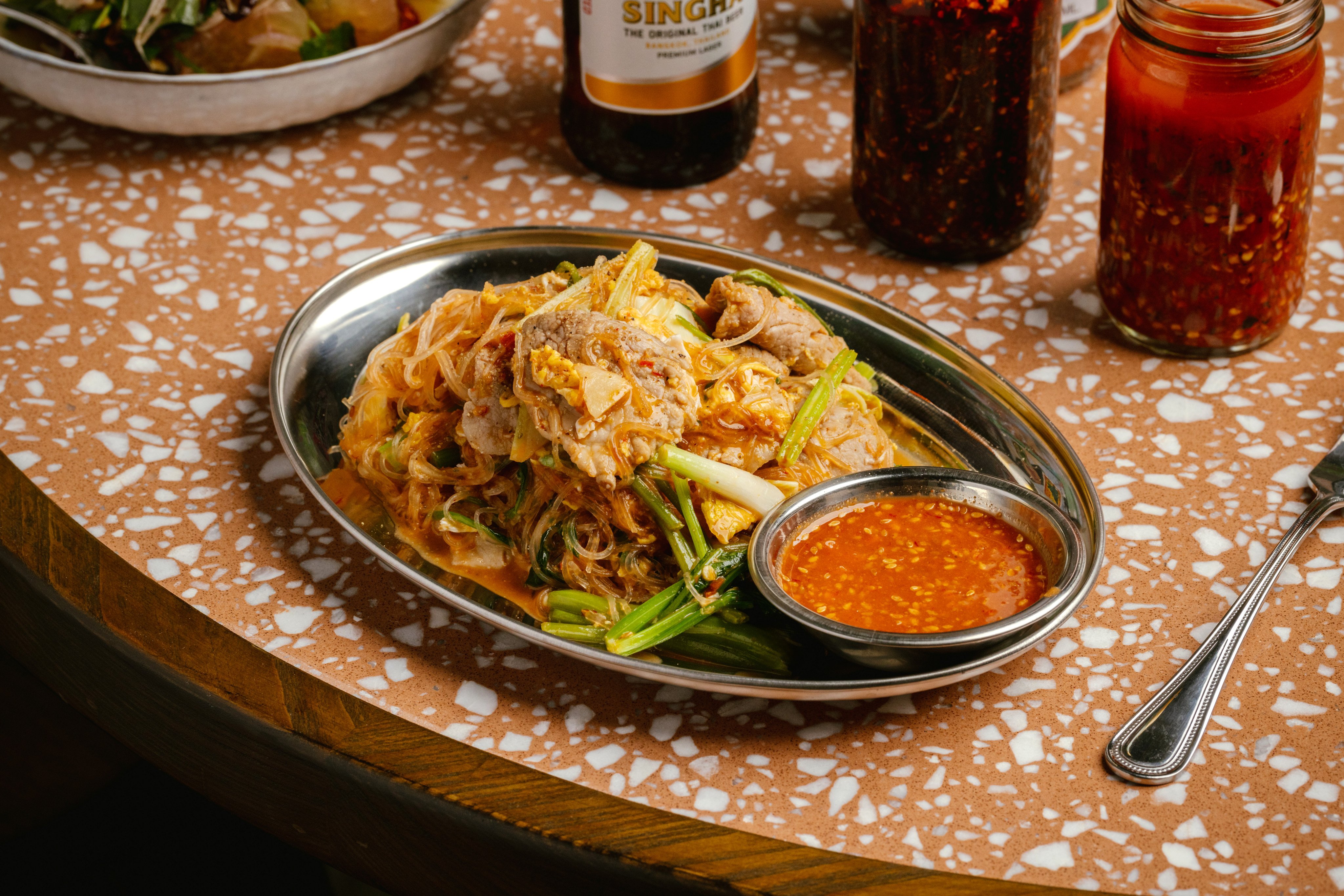 One of chef Adam Cliff’s favourites is the pork and glass noodles stir-fried with fermented tofu, a take on the Thai dish called suki haeng. Photo: Nicholas Wong/Sixteen Photography