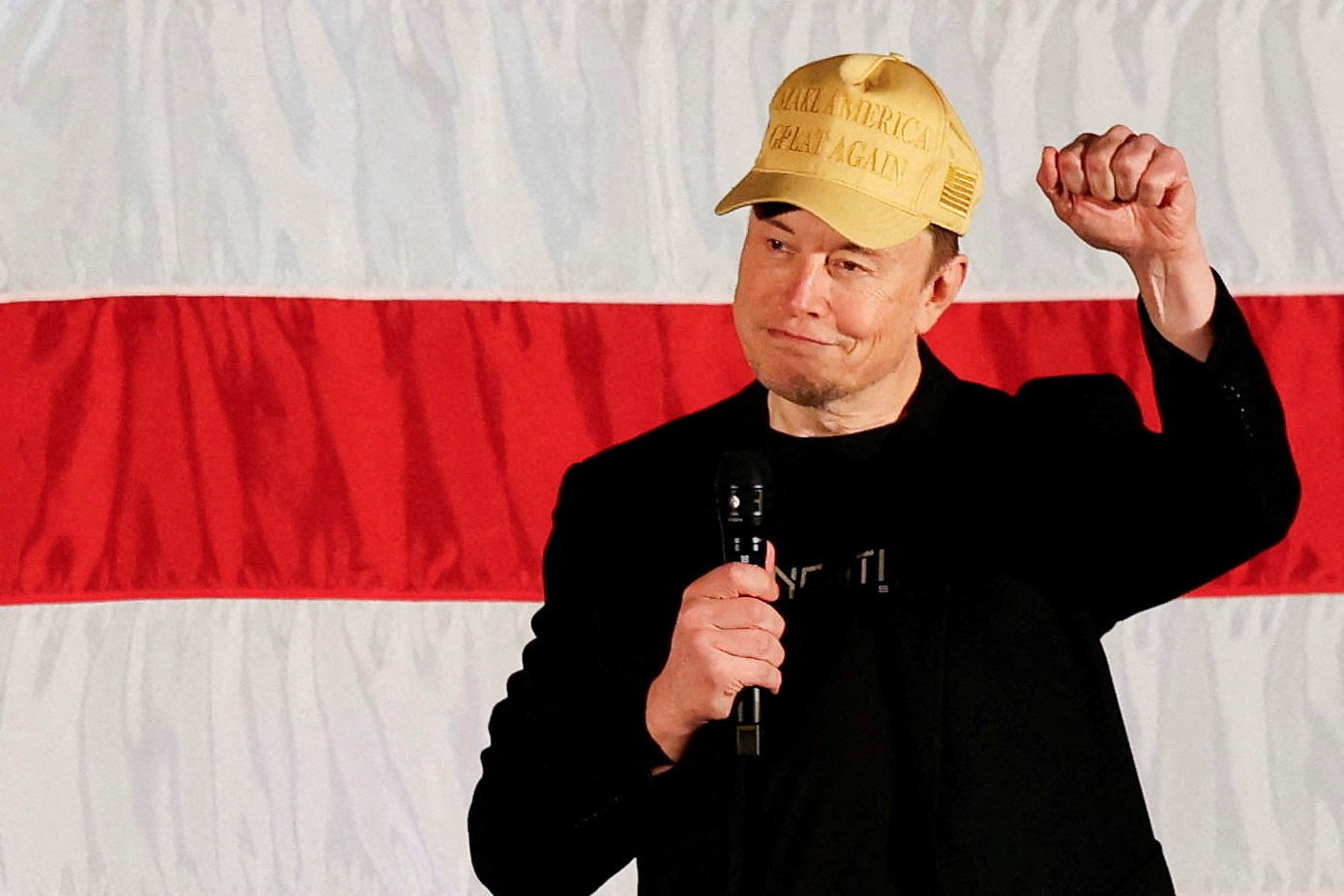 Elon Musk, donning a gold ‘Make America Great Again’ hat, at the Pennsylvania campaign event. Photo: Reuters