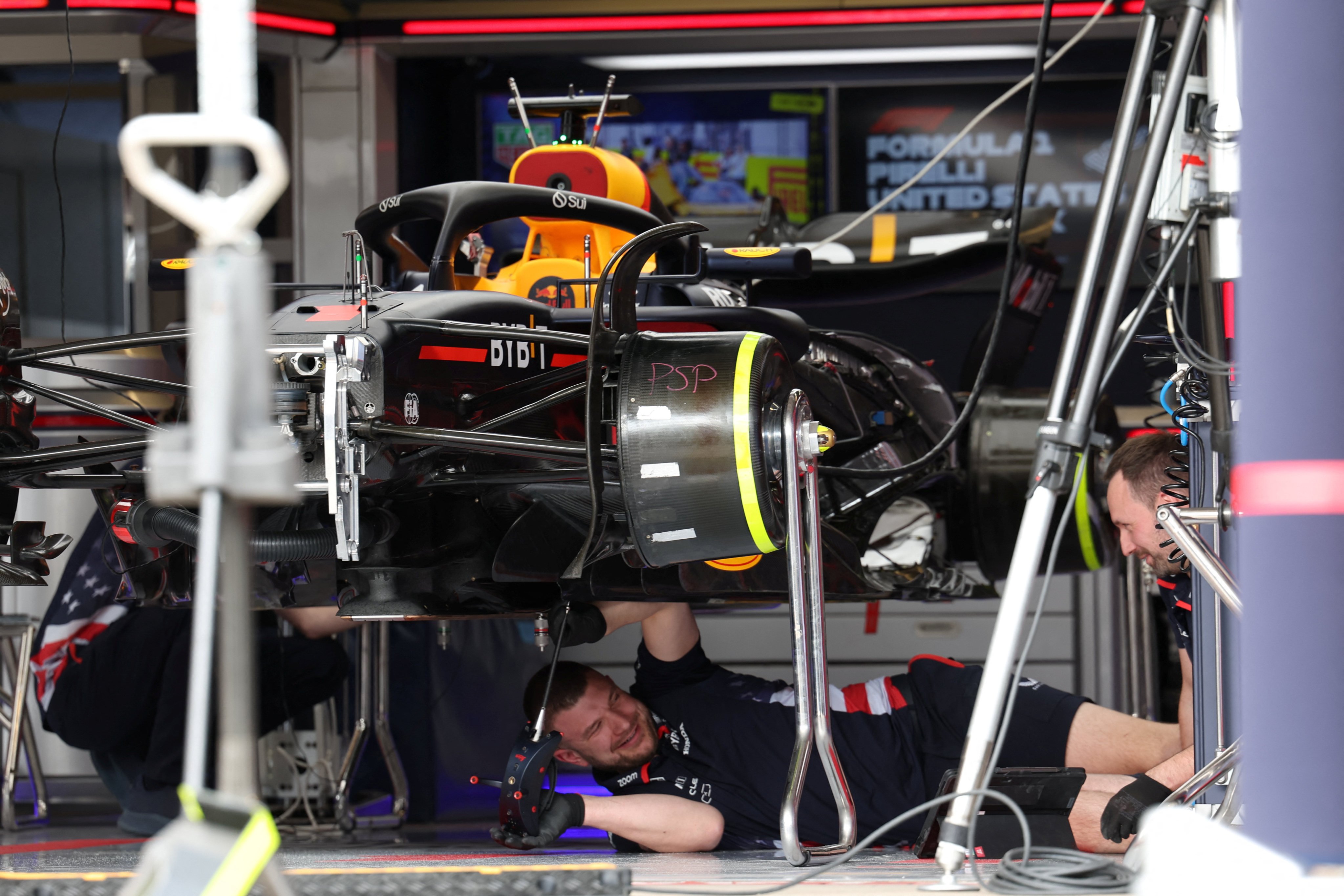 Mechanics work in the pits ahead of the US Grand Prix in Austin, Texas. Photo: Reuters