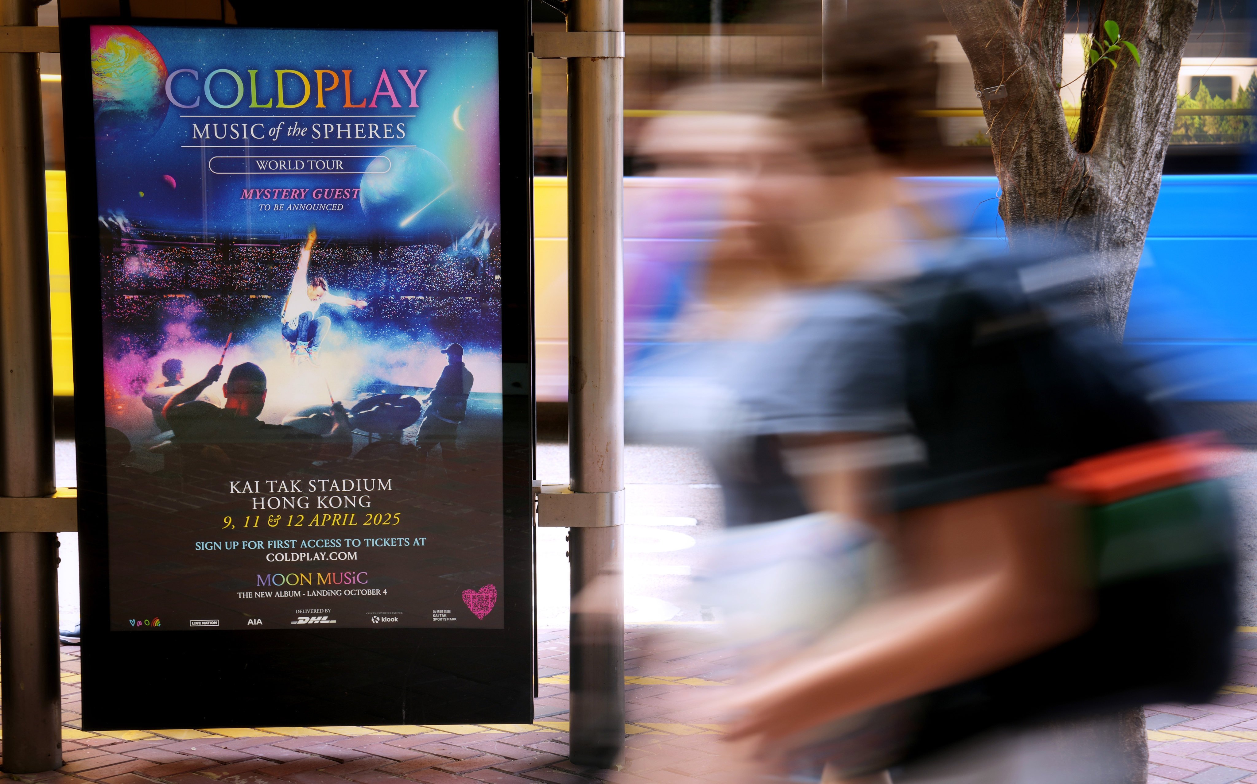 A poster advertising Coldplay’s concert dates in Hong Kong are seen at a bus stop in Admiralty district on October 7. Photo: Elson Li