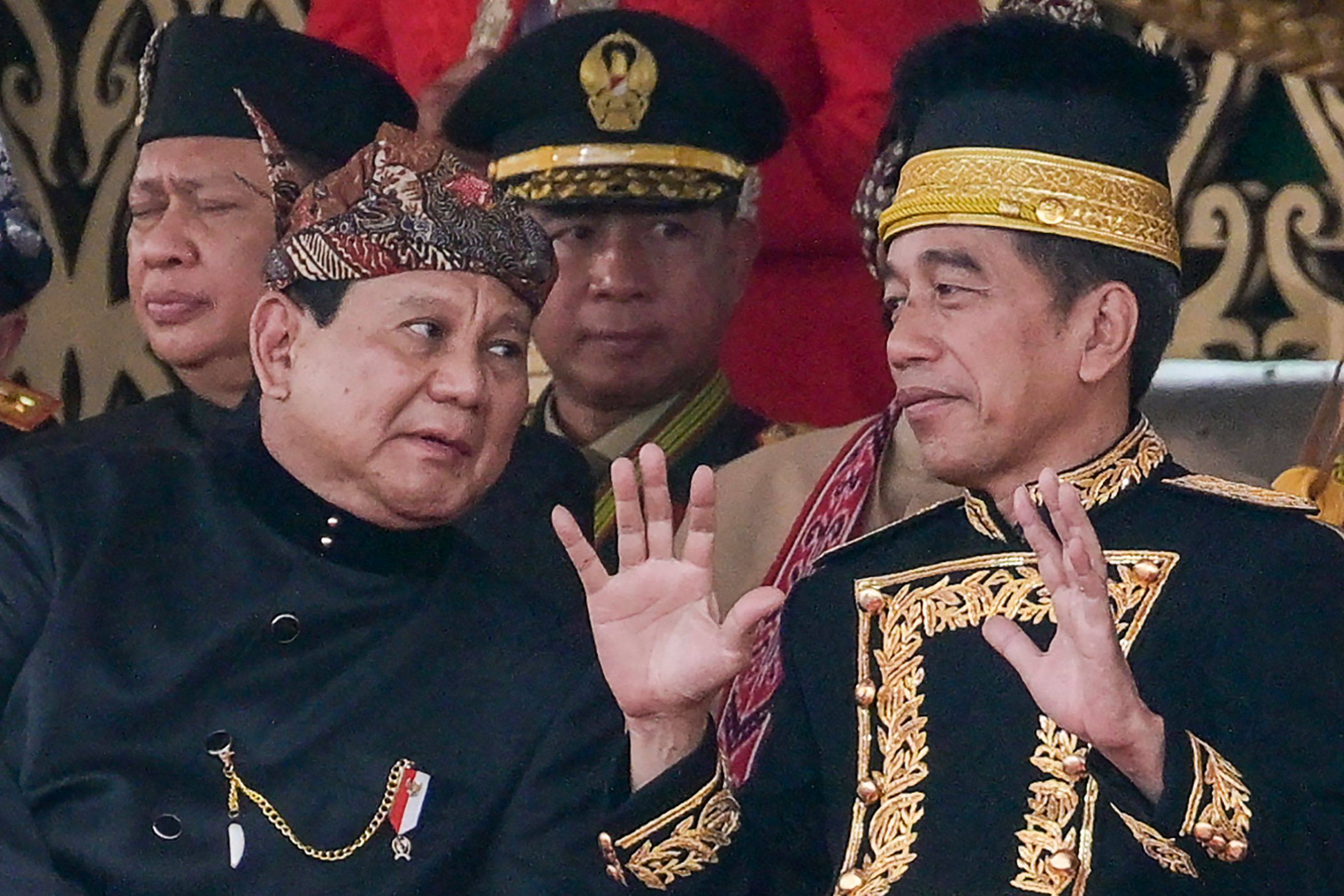 Indonesian President Joko Widodo talks to Prabowo Subianto in the future capital Nusantara in August. Photo: AFP