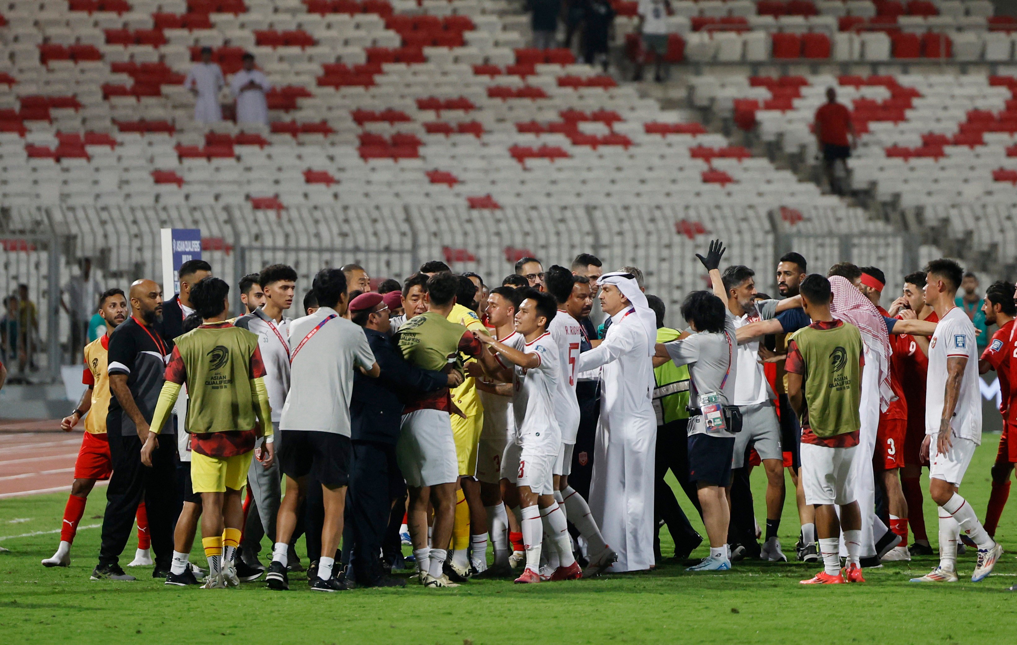 Bahrain and Indonesia players clash after the match at the Bahrain National Stadium last week. Photo: Reuters