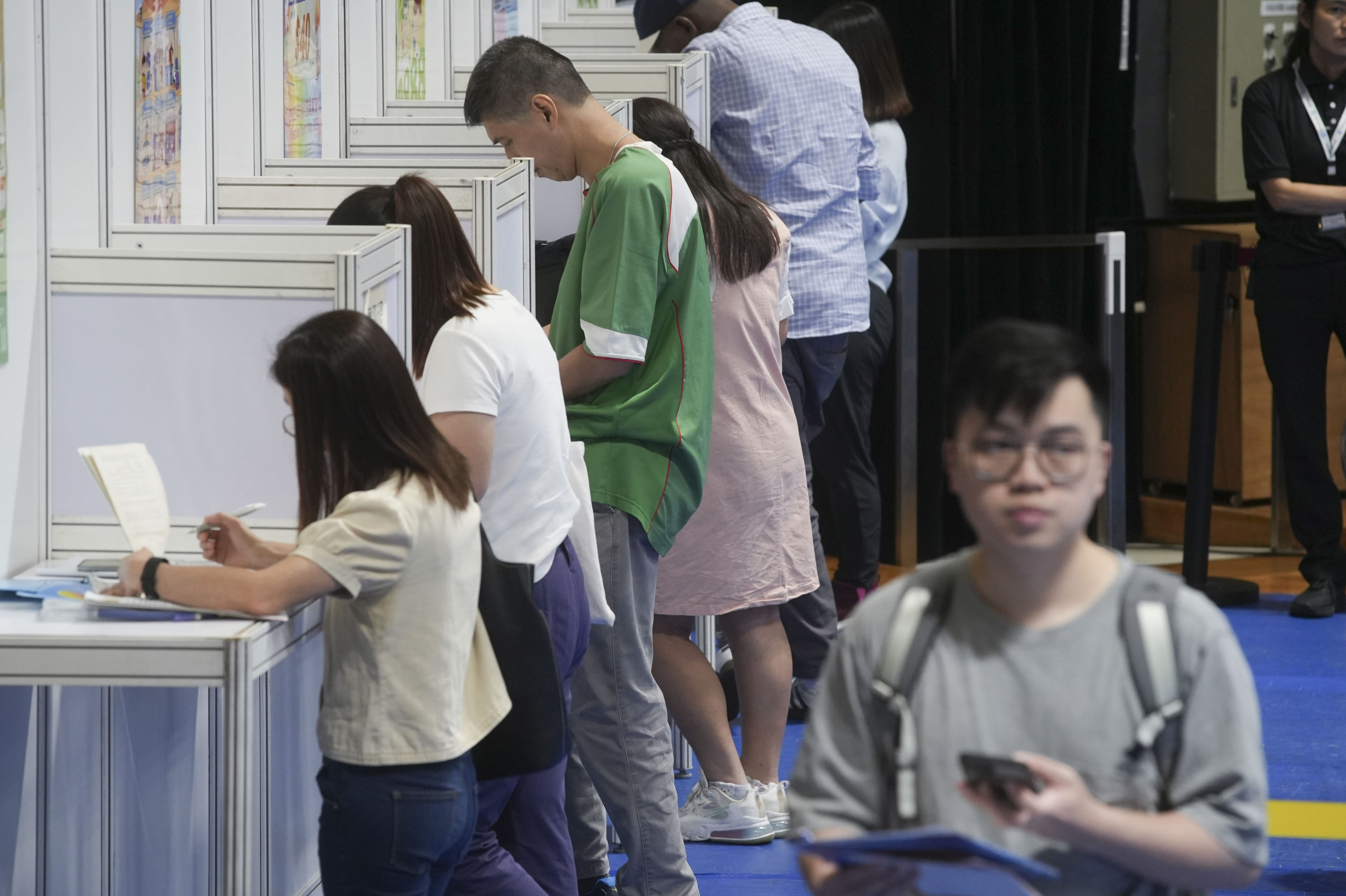 Job seekers attend a job fair held at MacPherson Stadium in Mong Kok. Photo: Sun Yeung