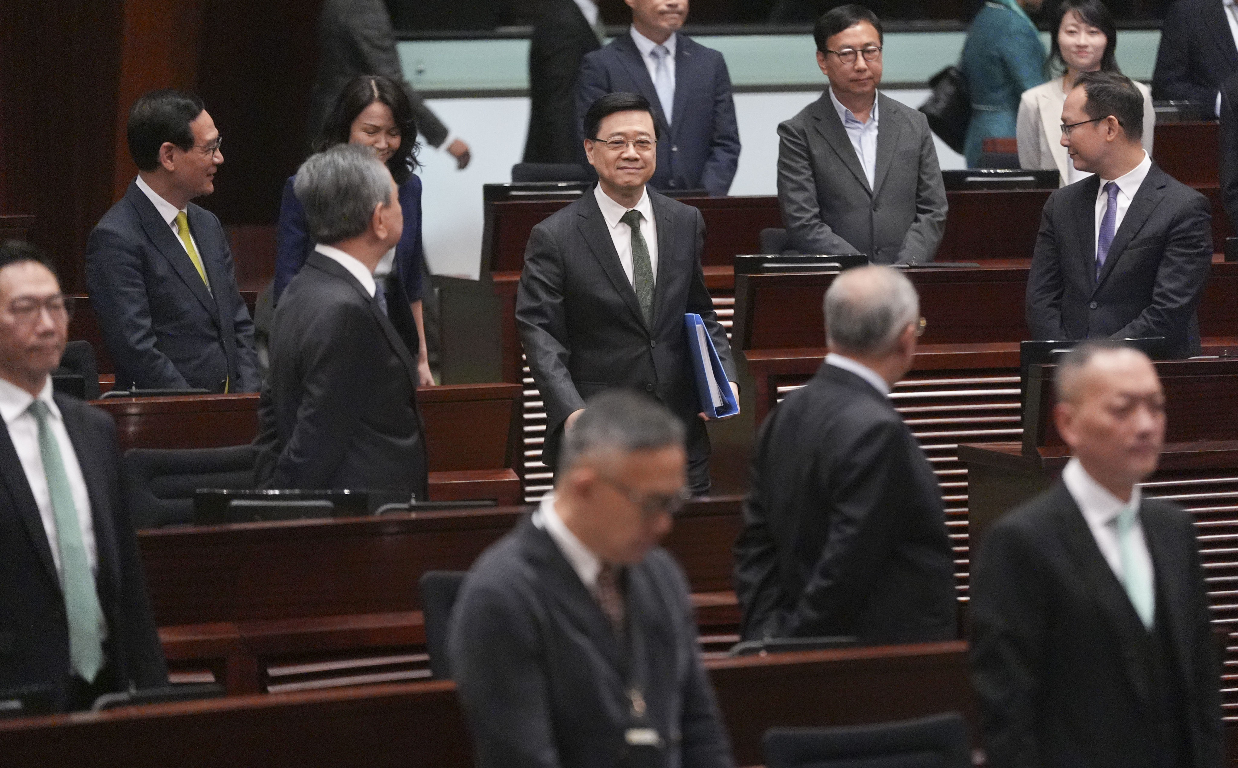 Chief Executive John Lee arrives to deliver his third policy address at the Legislative Council on October 16. Photo: Eugene Lee