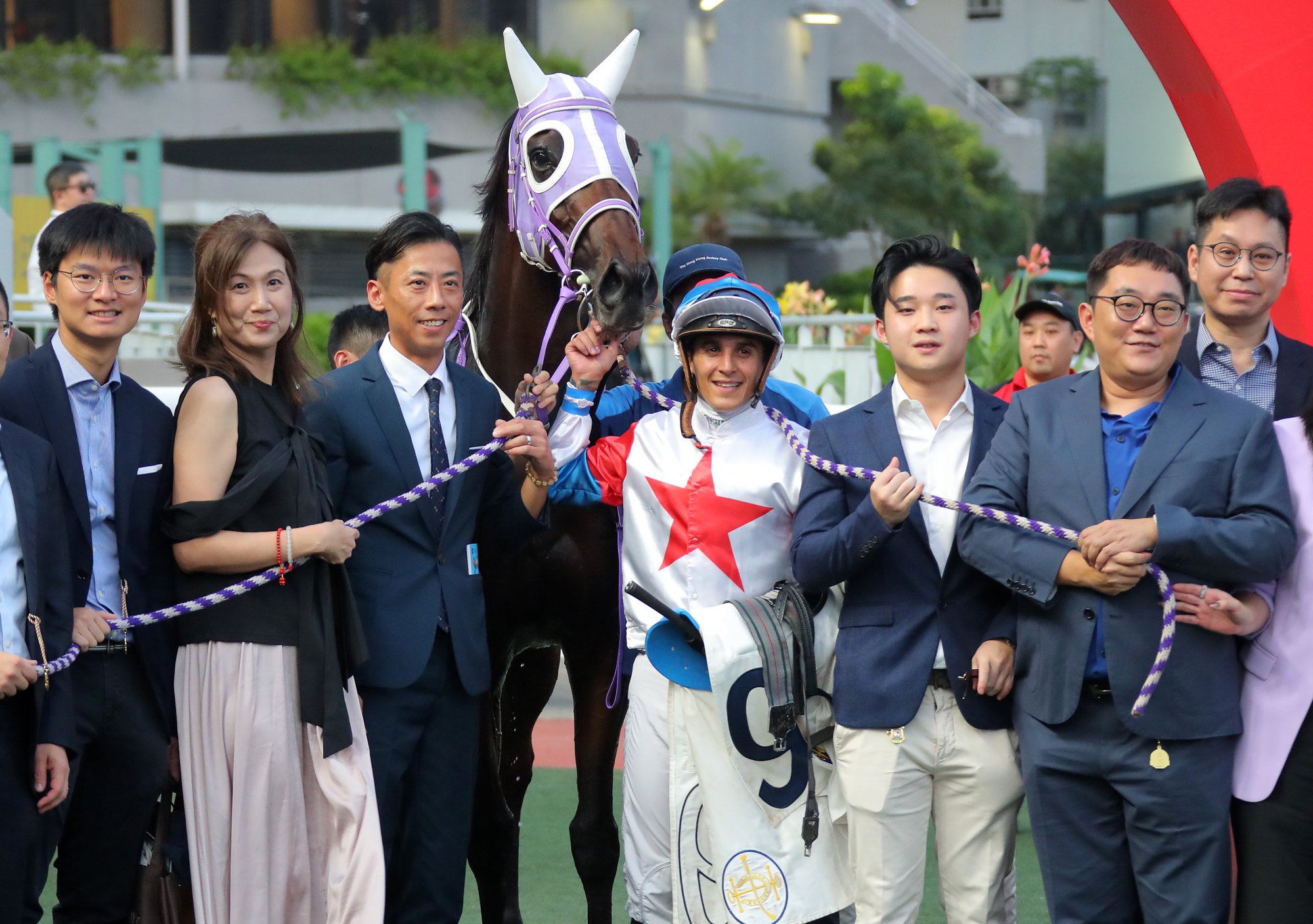 Jockey Keagan de Melo and connections of Winning Gold celebrate his latest victory.