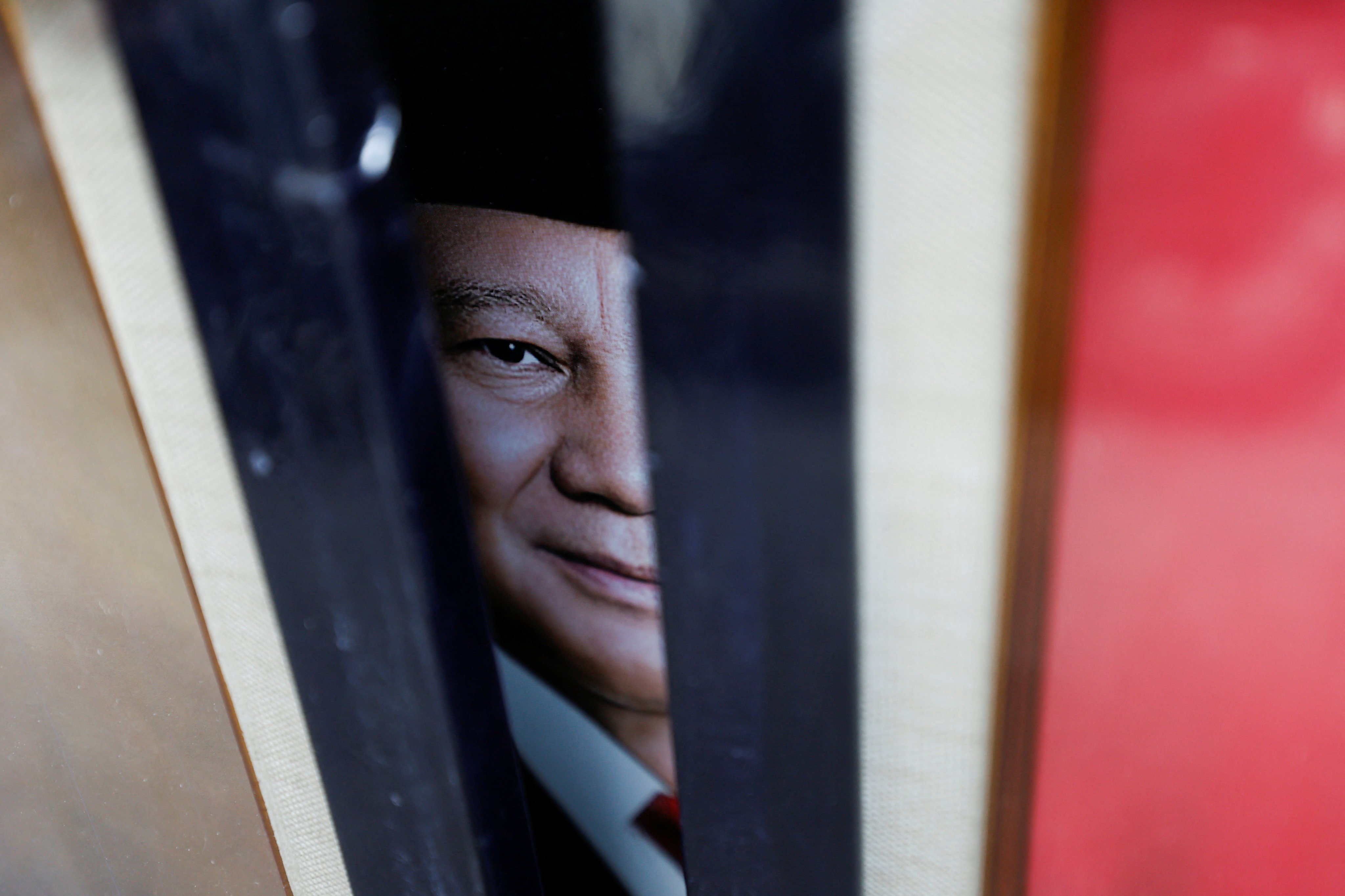 A picture of Prabowo Subianto, Indonesia’s president-elect, is seen at a stall in Jakarta on Friday ahead of his inauguration. Photo: Reuters