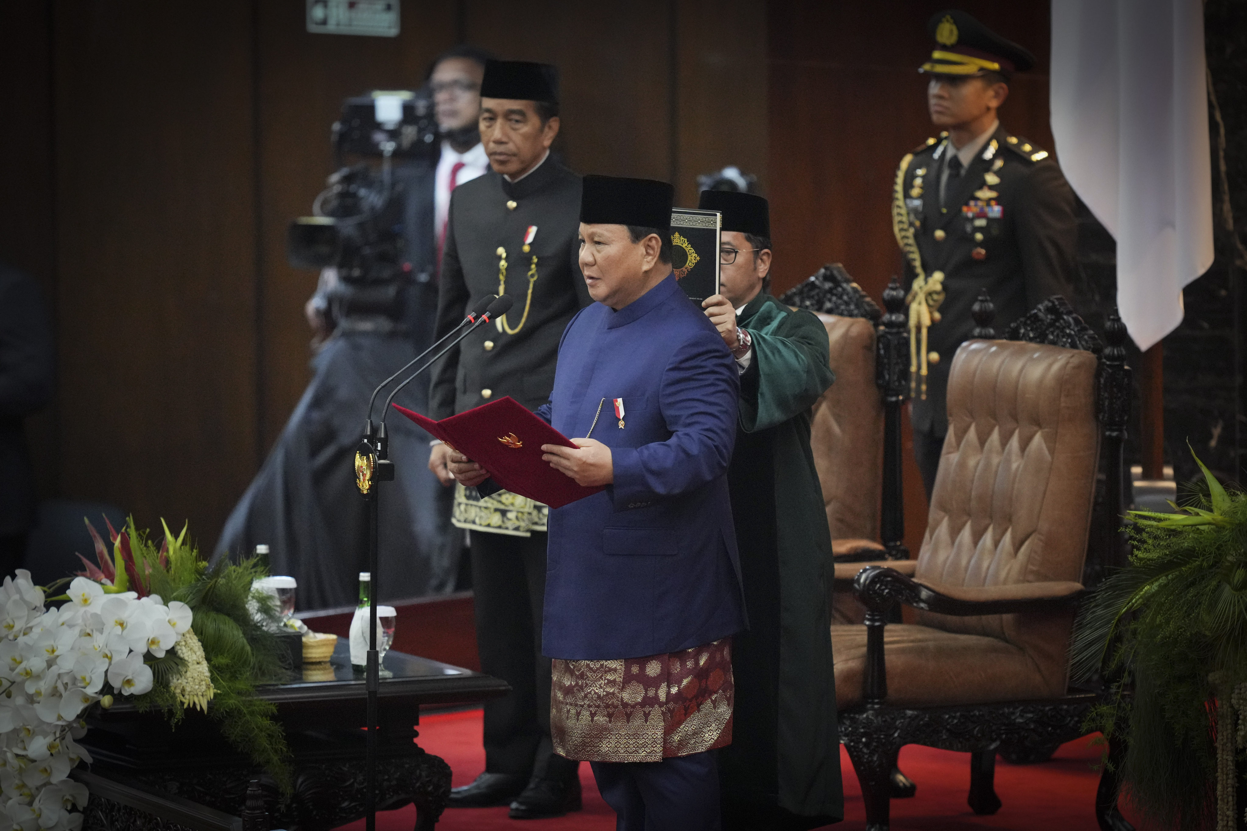 Indonesian President Prabowo Subianto takes the oath at the parliament building in Jakarta on Sunday. Photo: AP