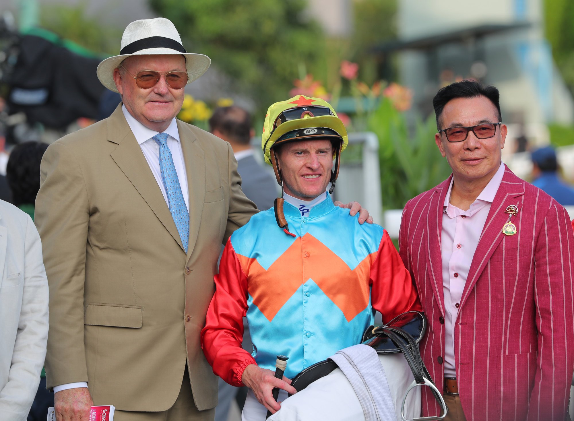 Trainer David Hayes (left) and jockey Zac Purton celebrate with connections.