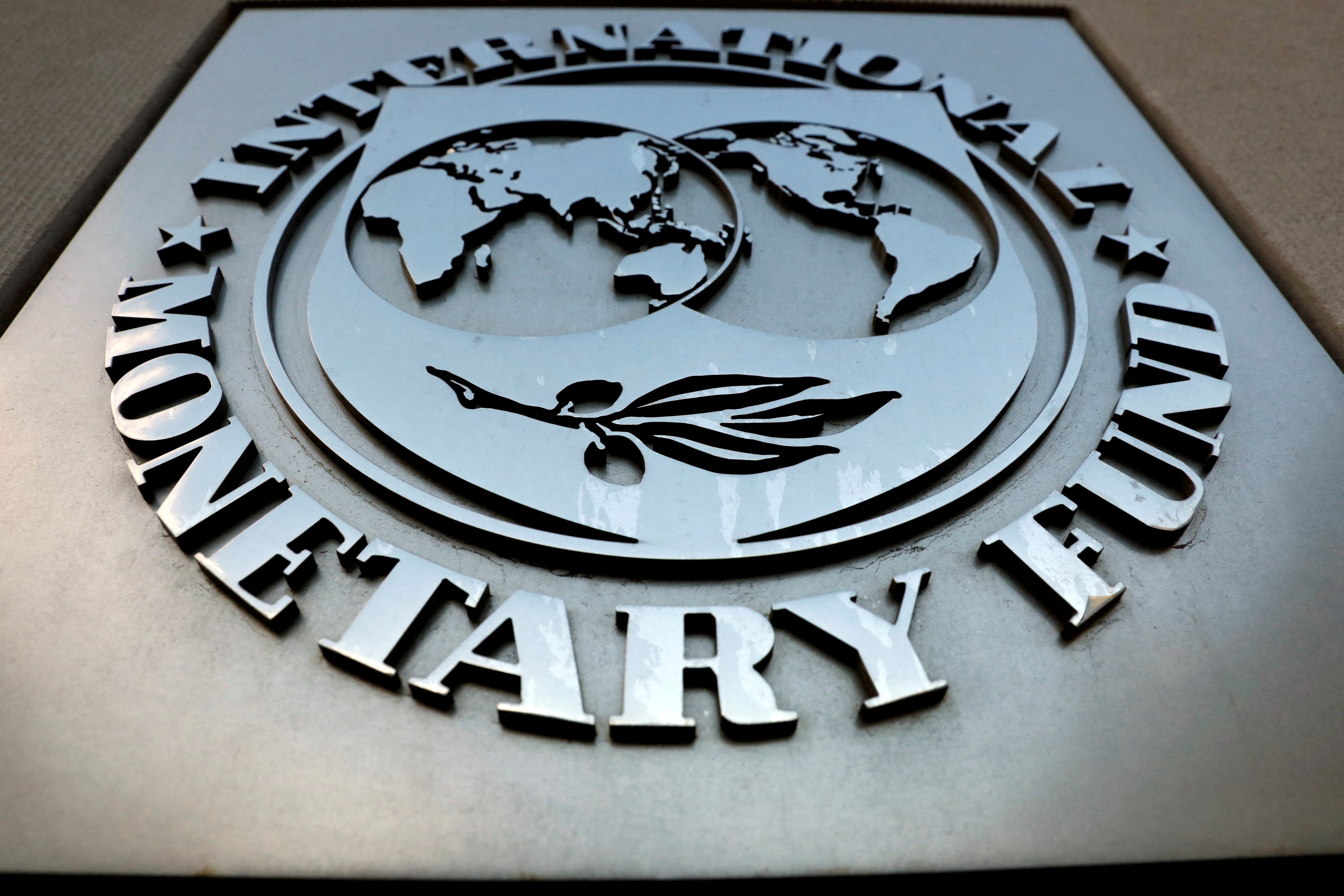 The International Monetary Fund (IMF) logo is seen outside its headquarters in Washington. Photo: Reuters