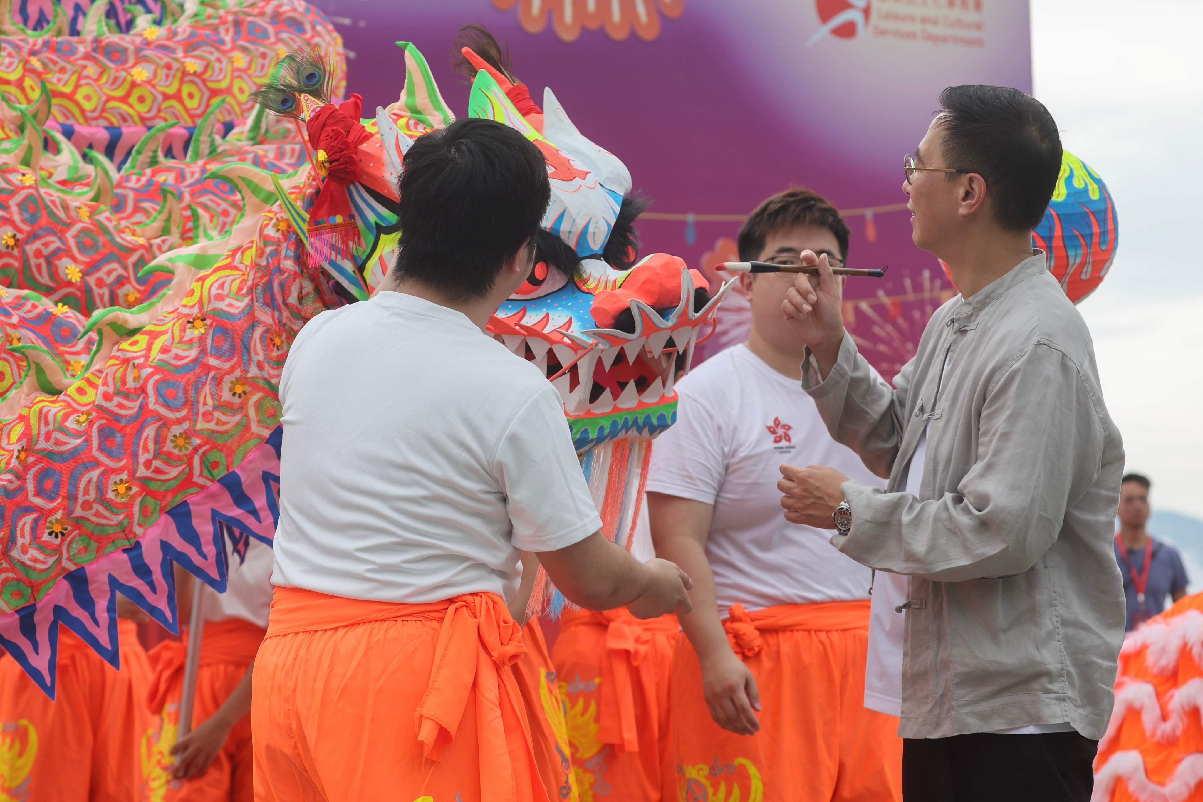 Secretary for Culture, Sports and Tourism Kevin Yeung, right, attends a ceremony at Tamar Park on September 22. Yeung and his bureau have come in for a rare bout of public criticism in the annual policy address. Photo: Edmond So