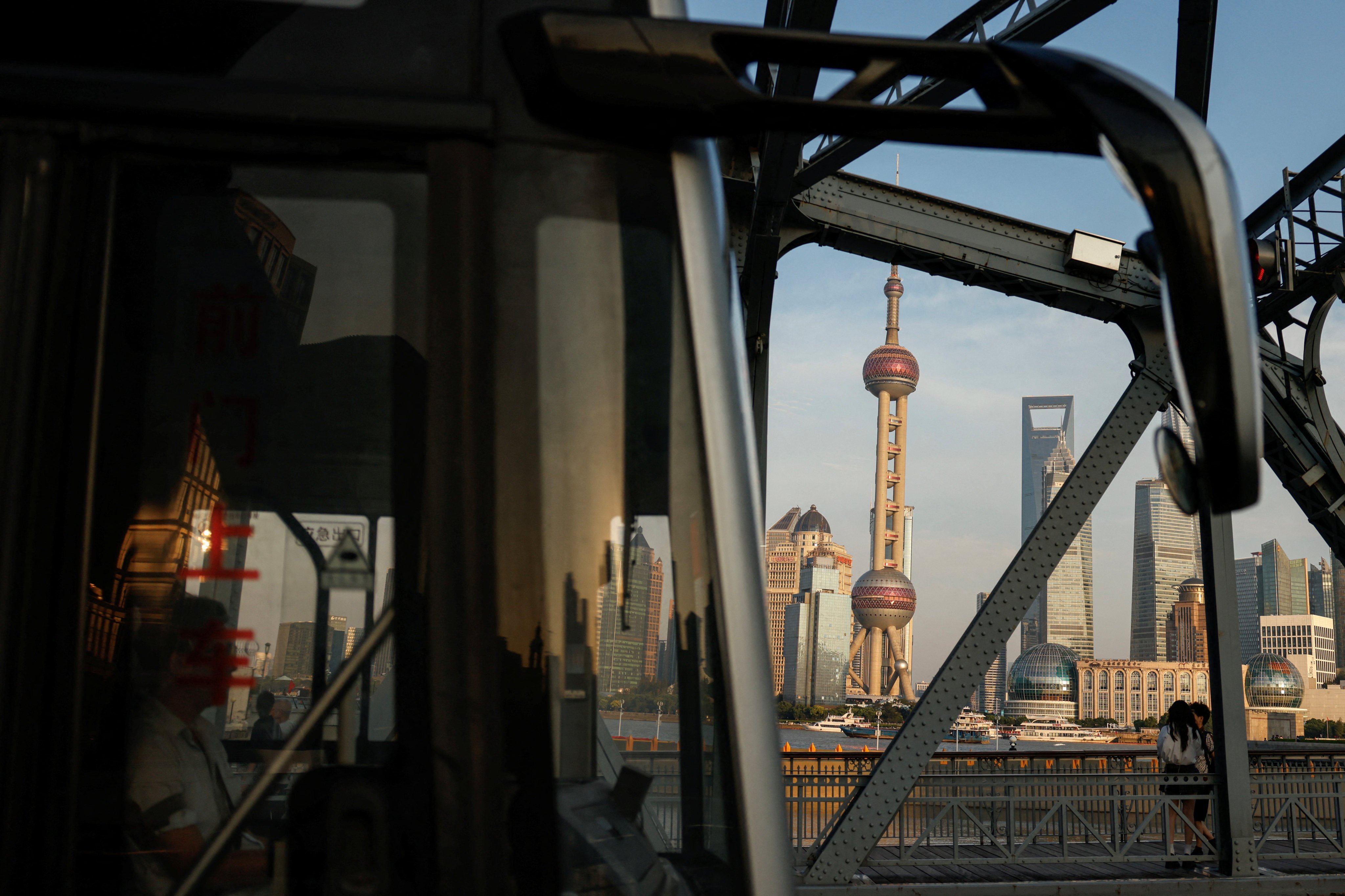 A bus moves through Shanghai. Photo: Reuters 