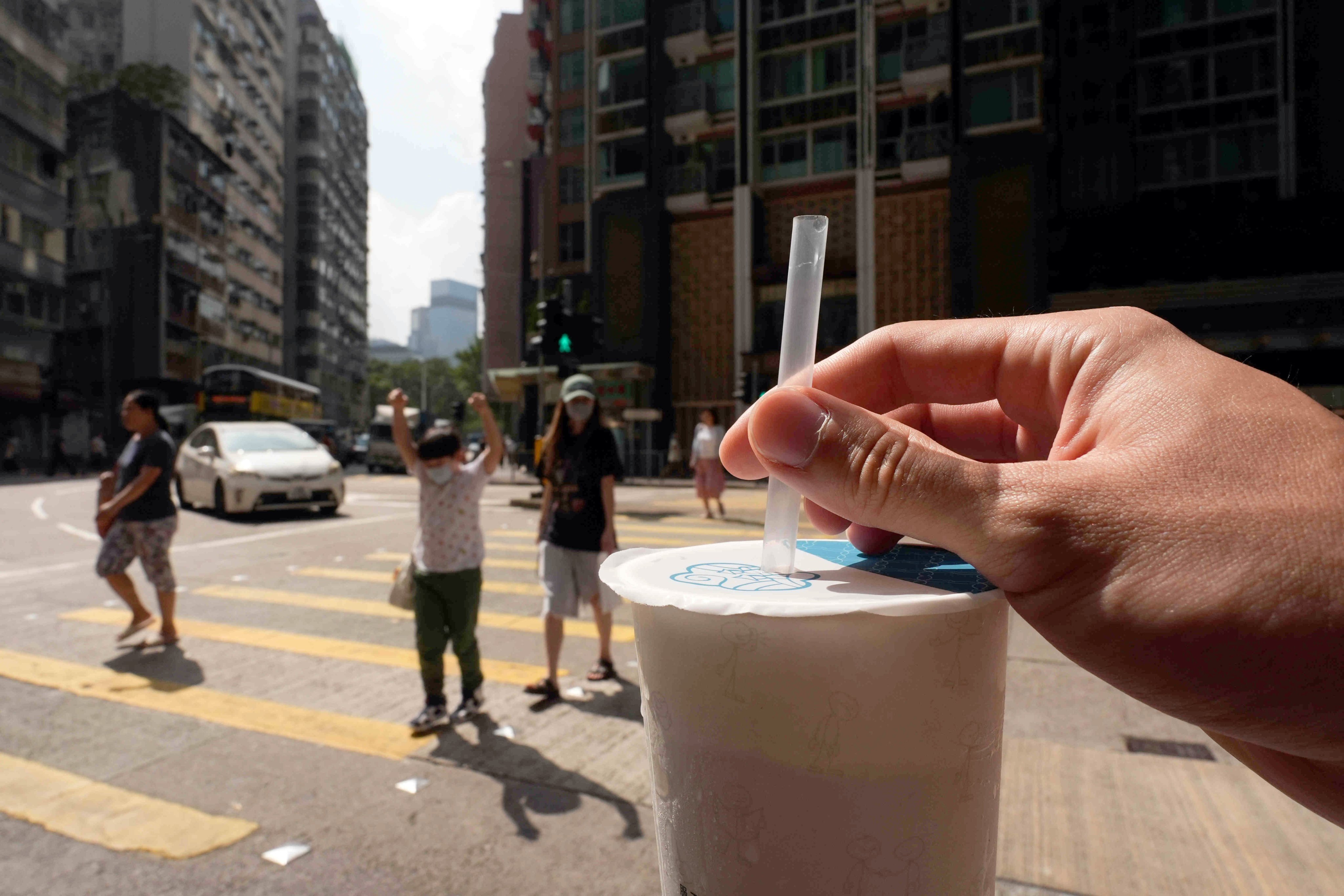 A takeaway drink sold in Causeway Bay offers customers plastic straws, a disallowed item. Photo: Eugene Lee