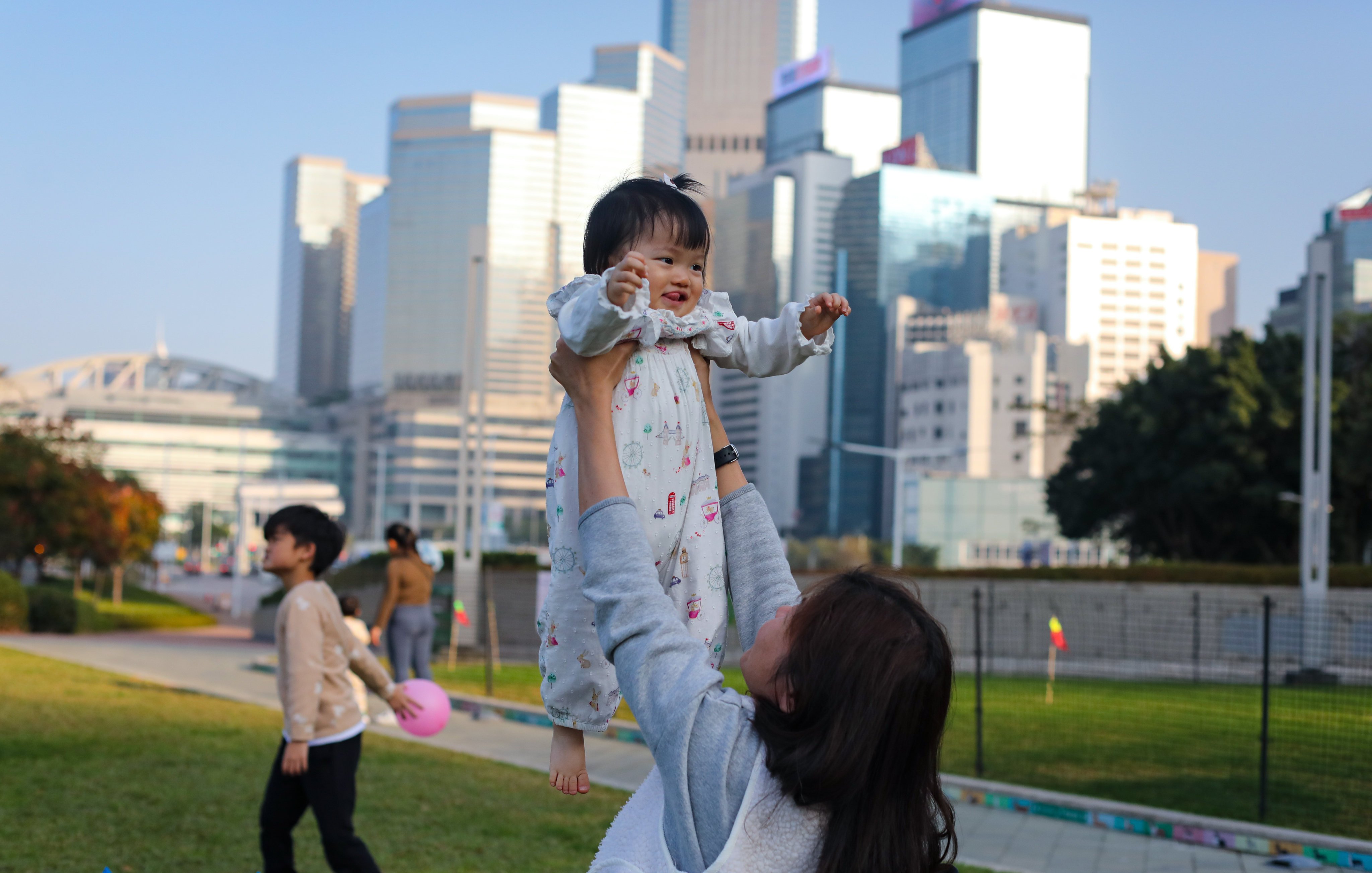 A mother with her child at a park in Admiralty. Photo: Xiaomei Chen