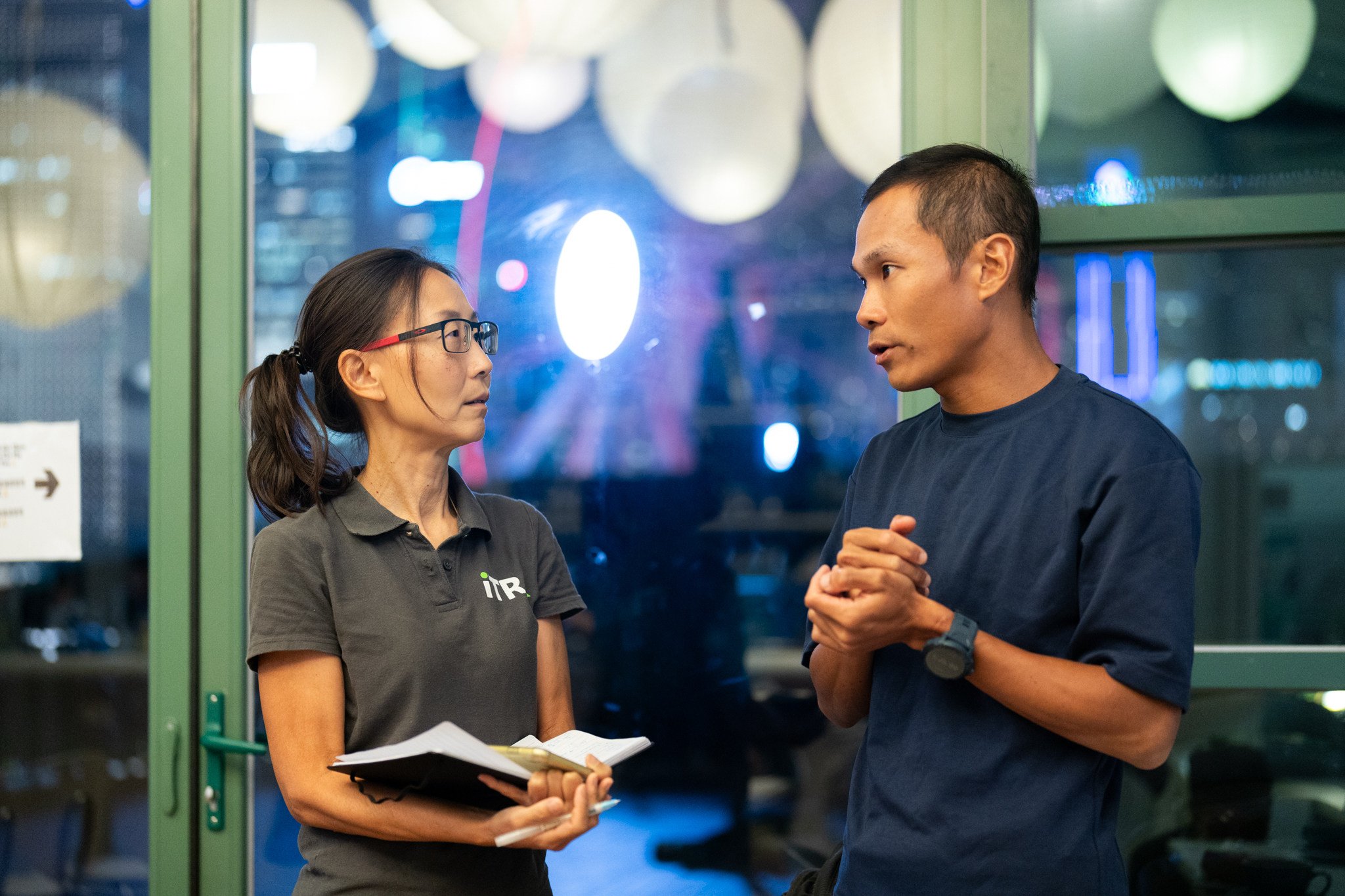 Hong Kong coach and trail runner Wong Ho-chung (right) with International Trail Running Association president Janet Ng. Photo: Lucien Chan