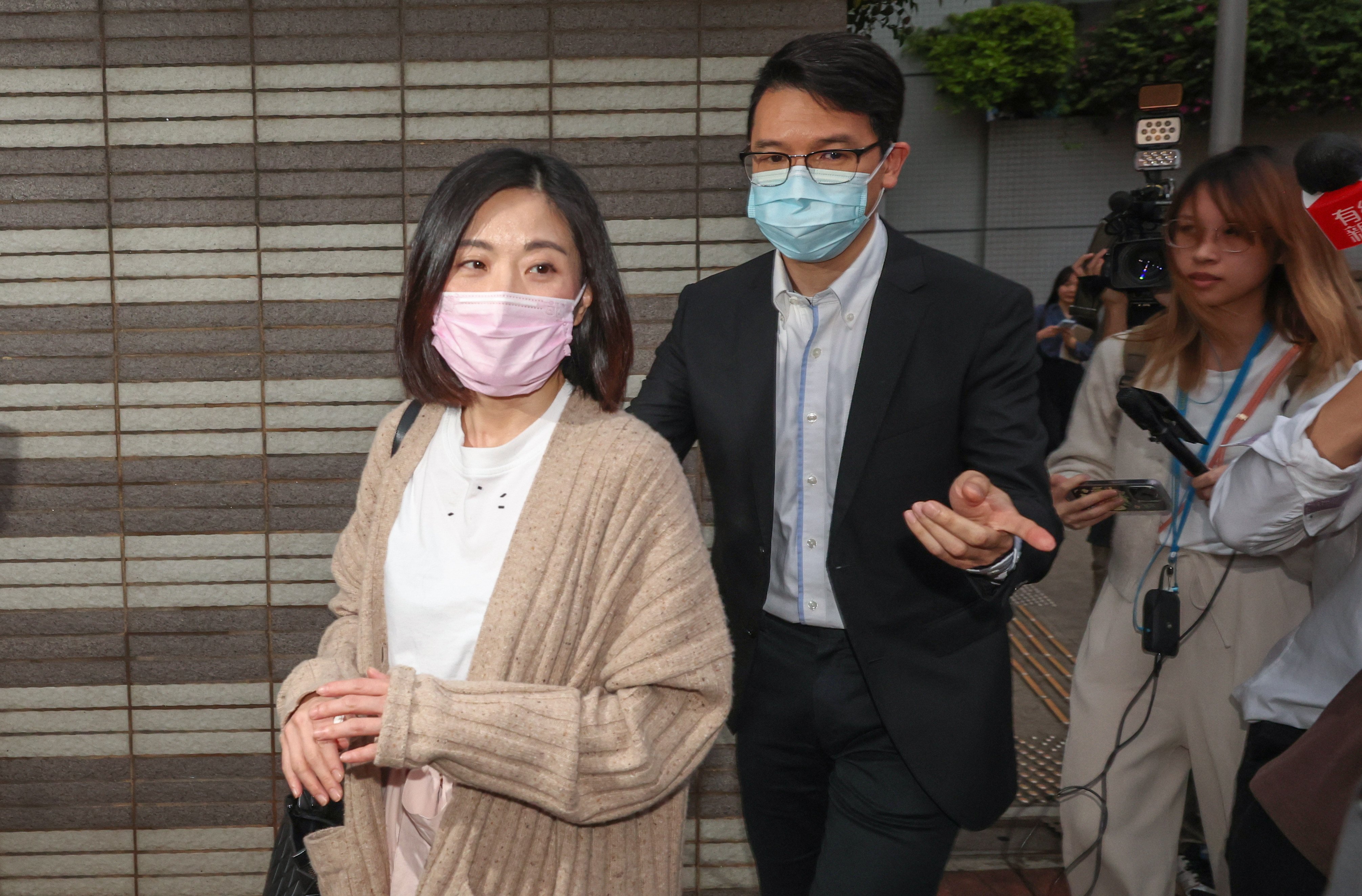 Vivien Chuang (left) and her husband Chiu Ming-yu are seen leaving Kowloon City Court in April of last year. Photo: Yik Yeung-man