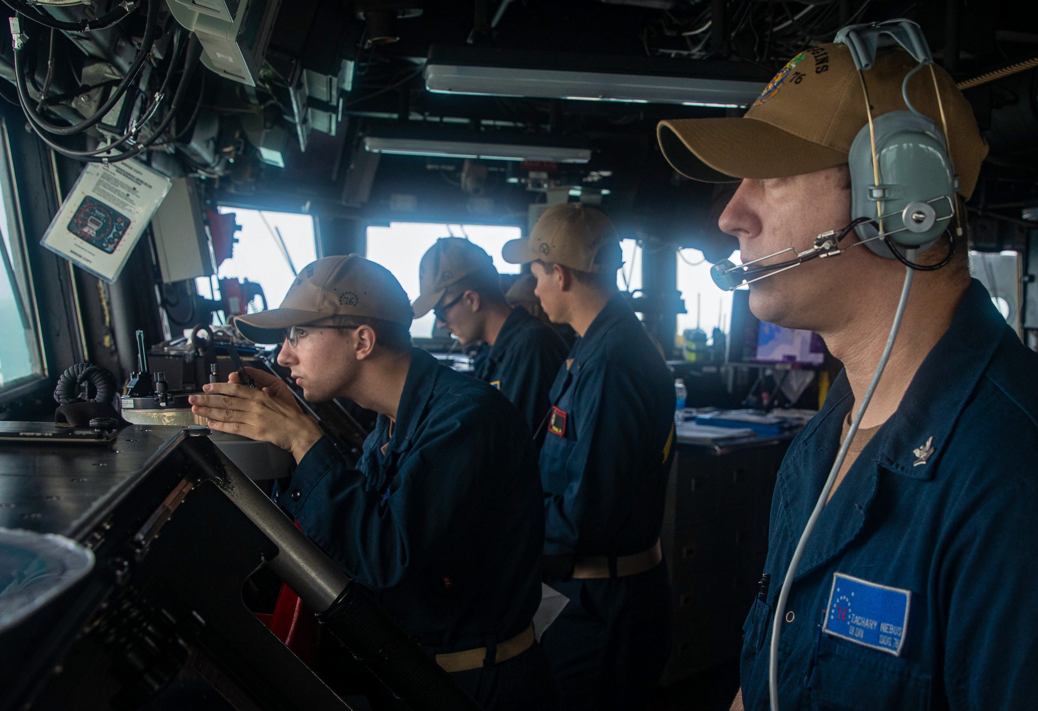 Sailors on the Arleigh Burke-class guided-missile destroyer USS Higgins take part in bilateral operations with the Royal Canadian Navy while transiting the Taiwan Strait on Sunday. Photo: US Navy