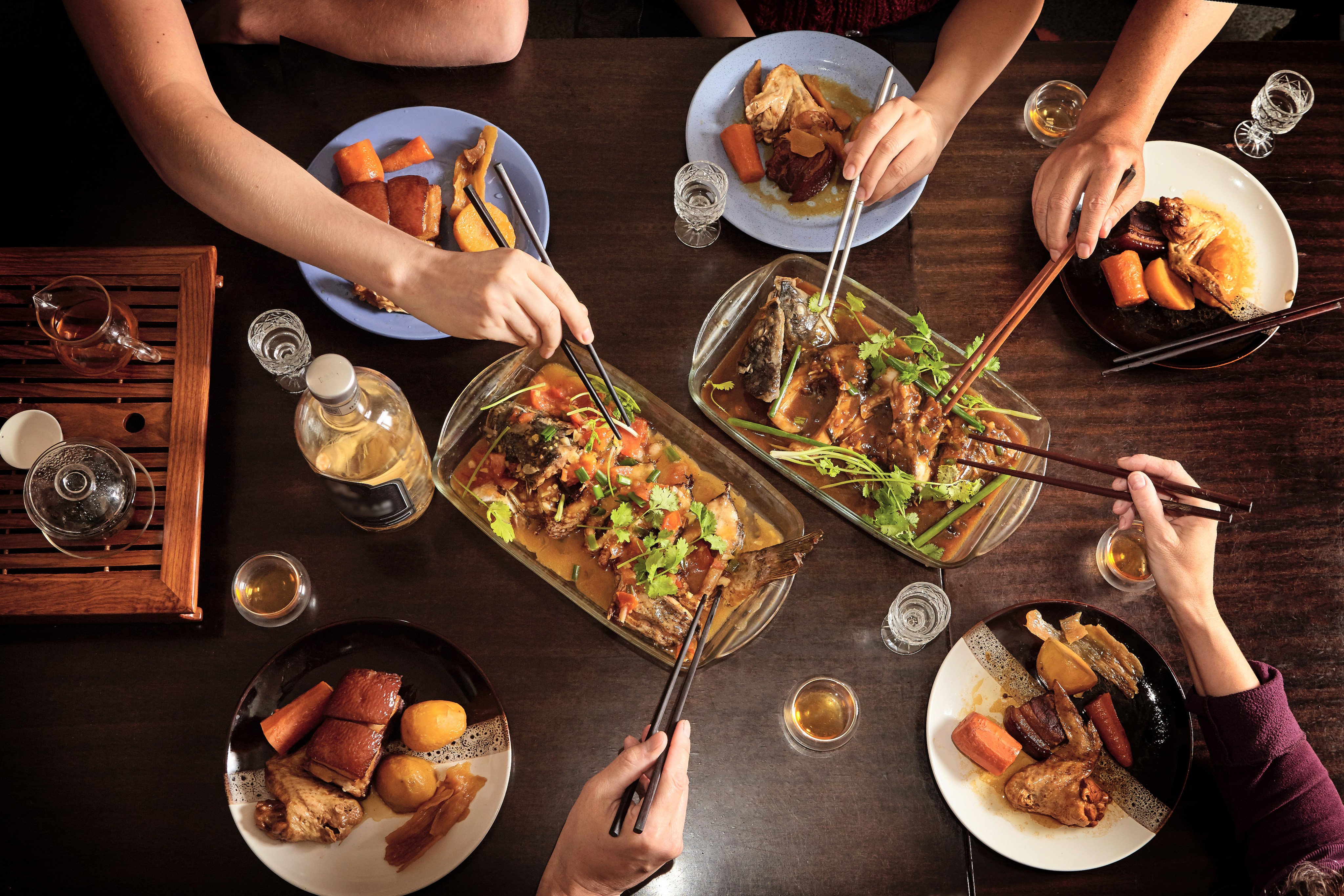 At the end of a Chinese family meal, it is common to see the tug of war over who picks up the bill. Photo: Shutterstock