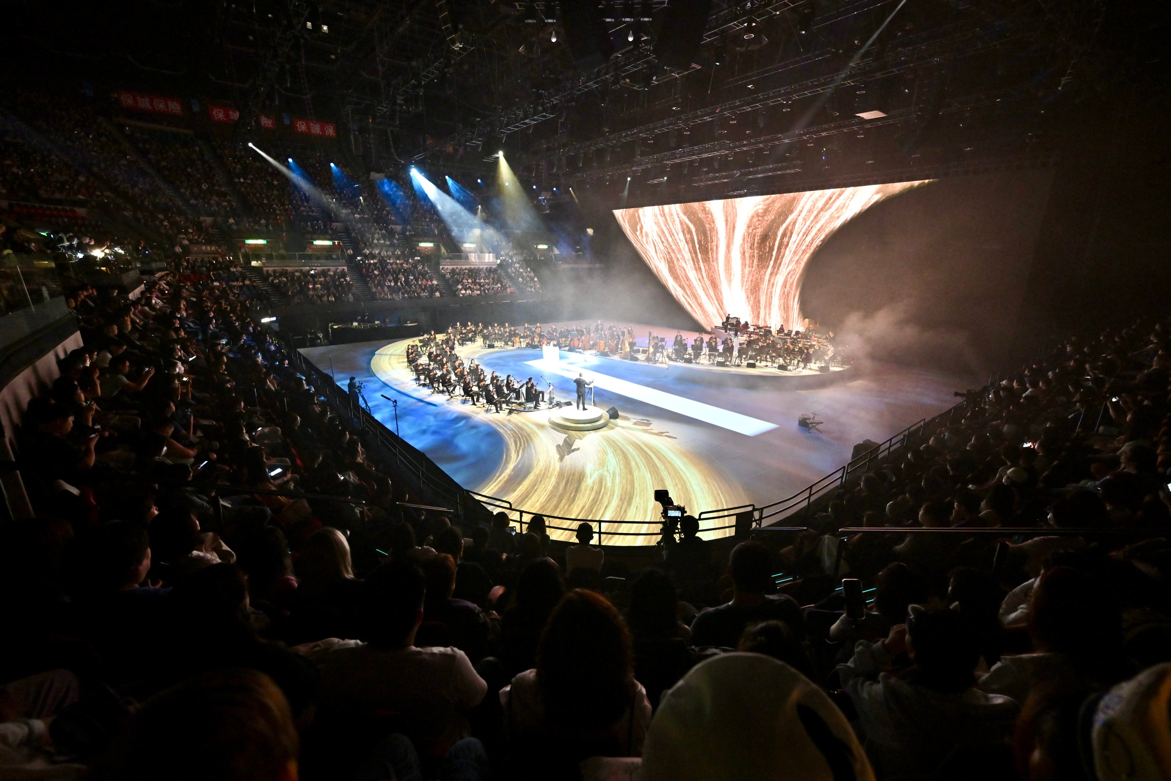 Tan Dun’s multimedia spectacle Sound River performed at the Hong Kong Coliseum with the Chinese composer conducting players from four symphony orchestras. Photo: LCSD