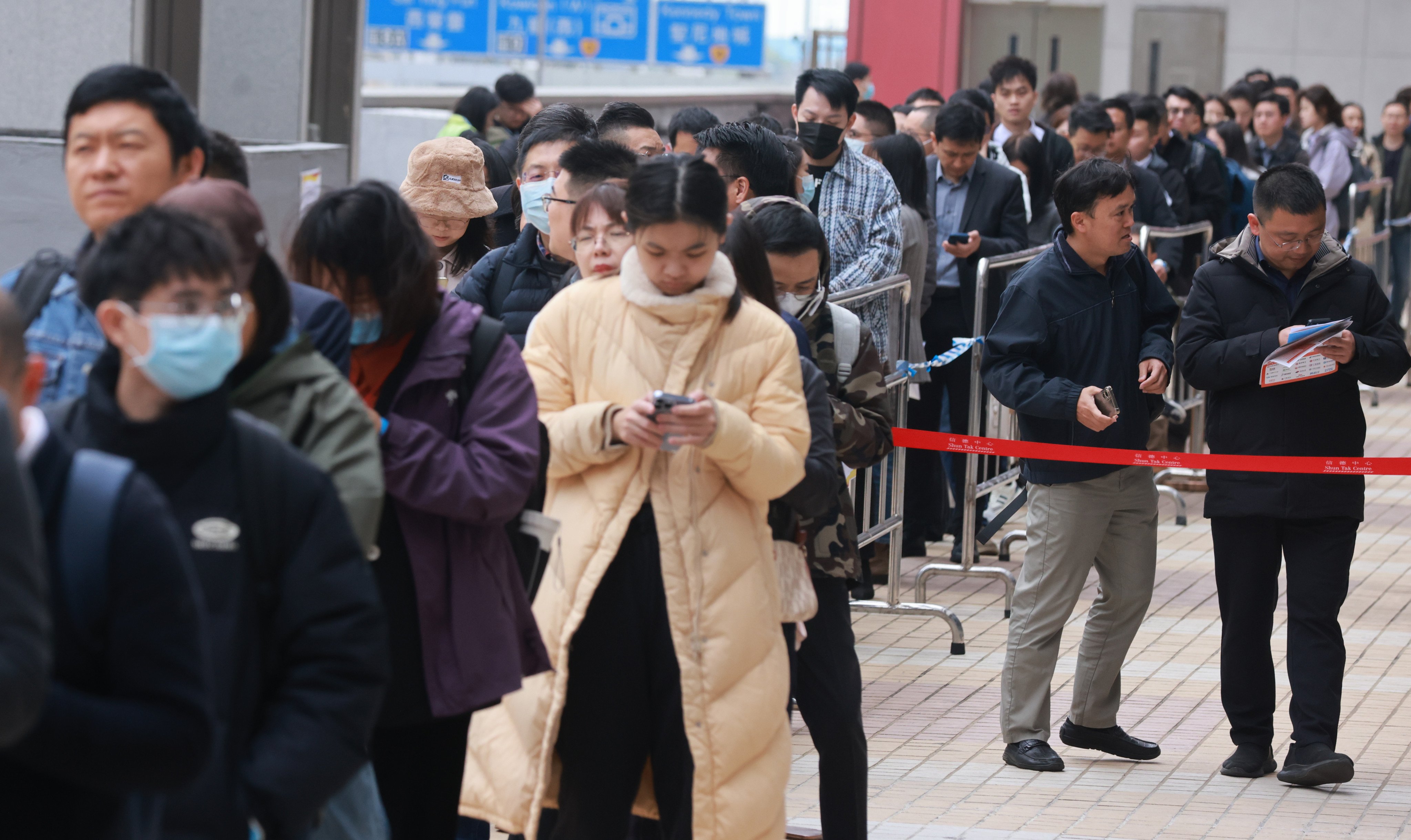 Job seekers line up to enter the 2024 Hong Kong Top Talent Recruitment Fair in Sheung Wan, on March 3. Photo: May Tse