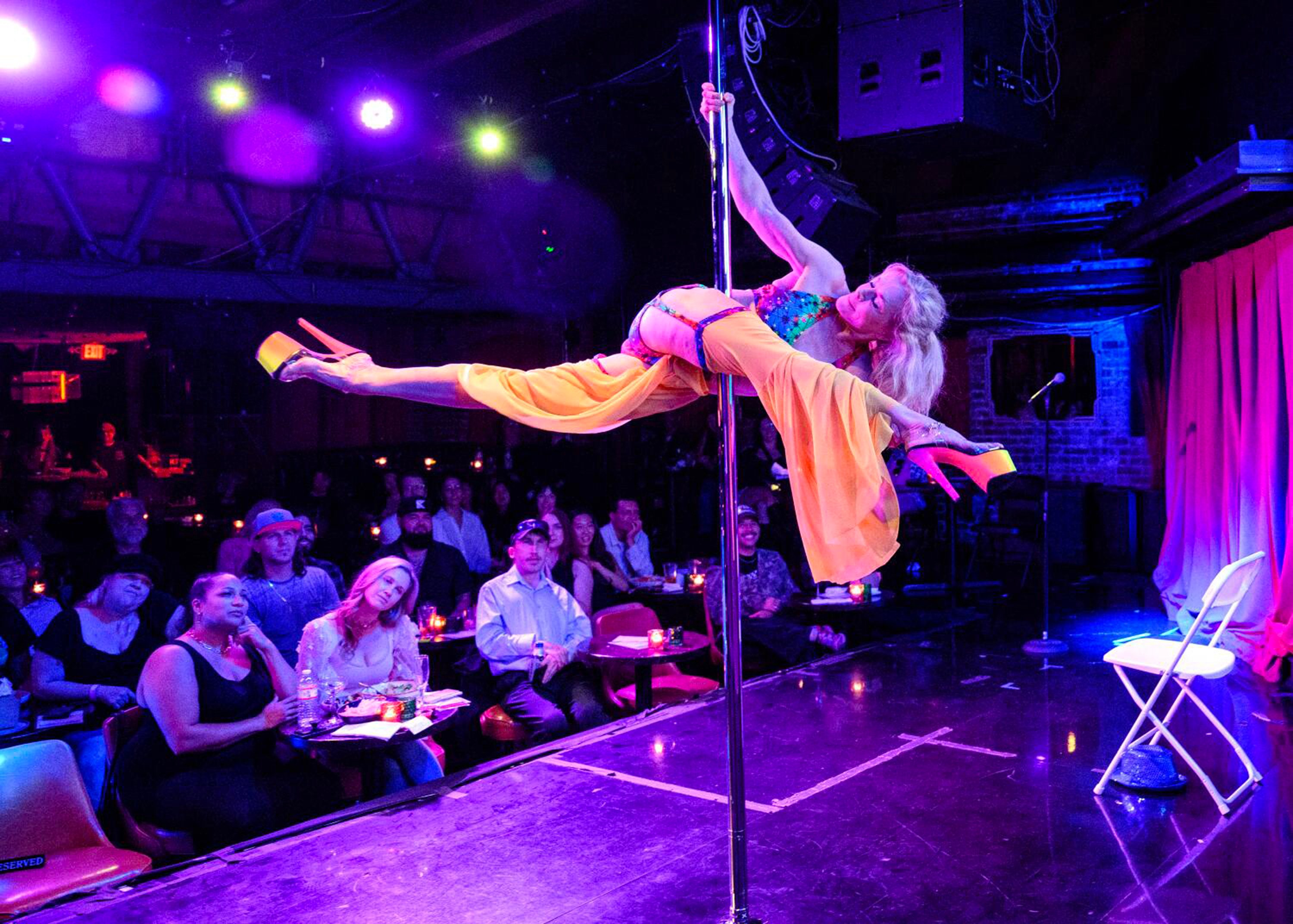 Mary Serritella, 71, pole dances in front of a live audience at The Bourbon Room in Hollywood, California, in September 2024. Photo: TNS