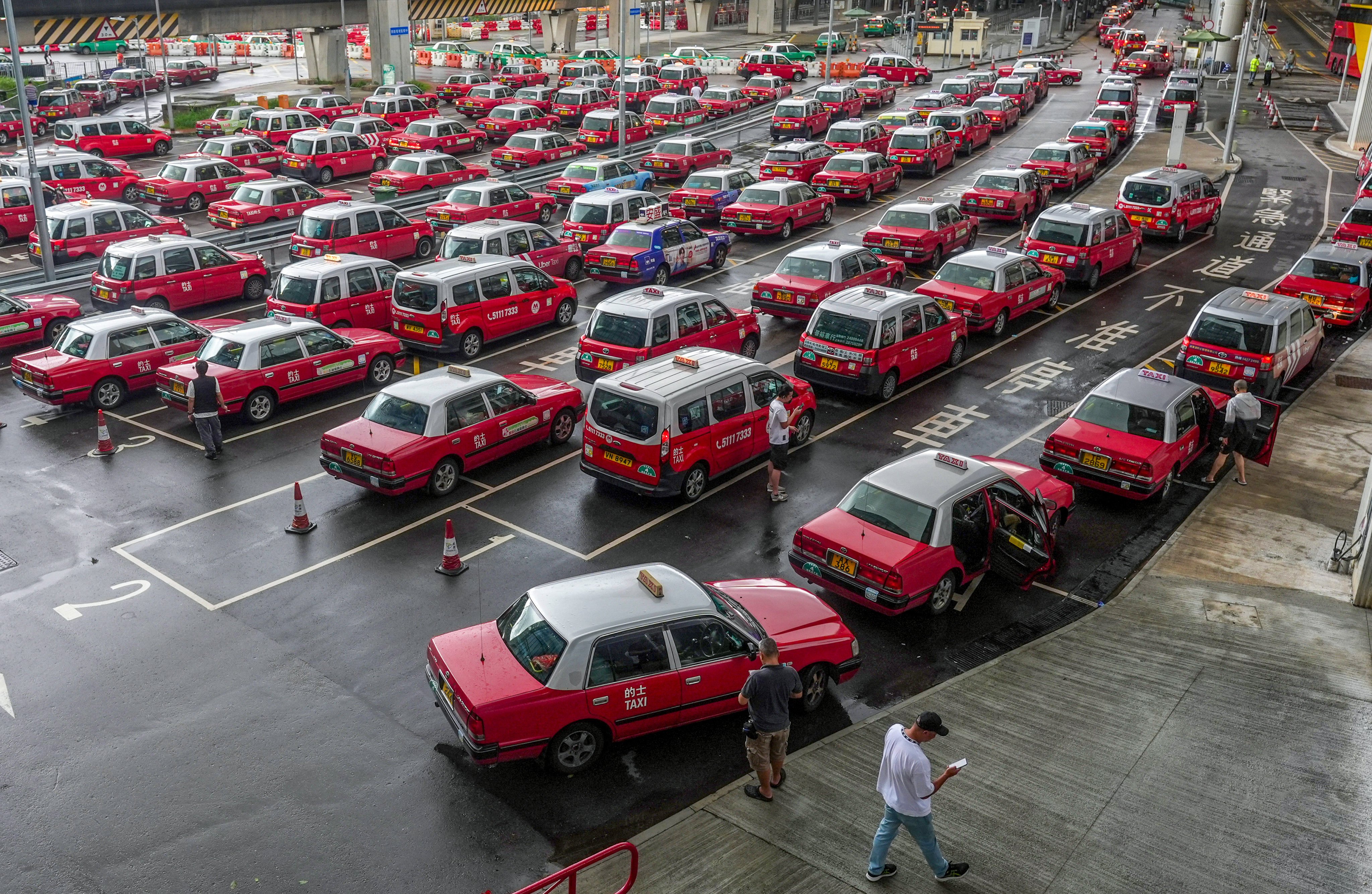 Rows of taxis outside Hong Kong International Airport in Chek Lap Kok. Photo: Eugene Lee