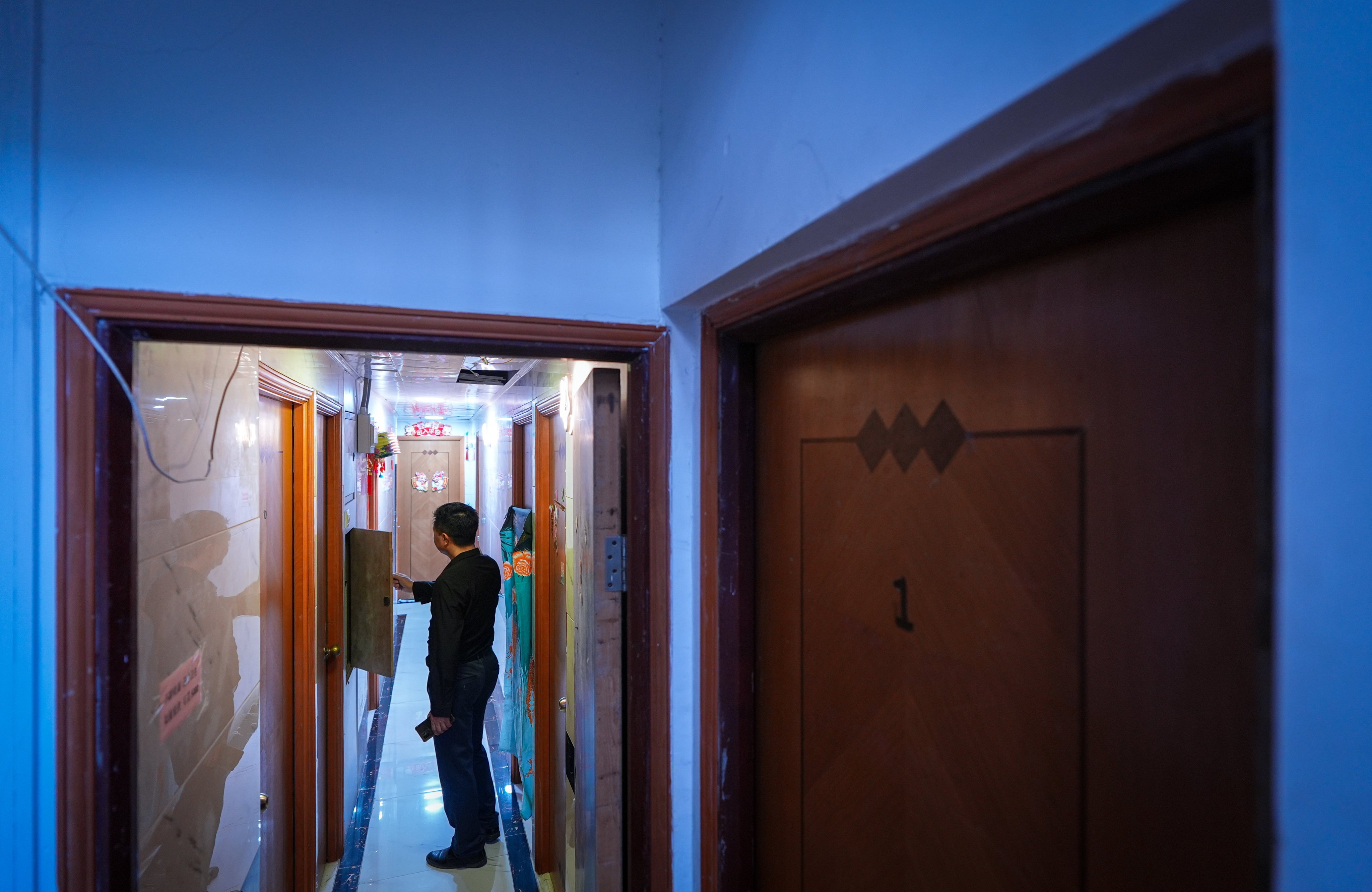 A subdivided flat in Cheung Sha Wan. New government regulations require such flats to be registered and meet certain basic living criteria. Photo: Eugene Lee