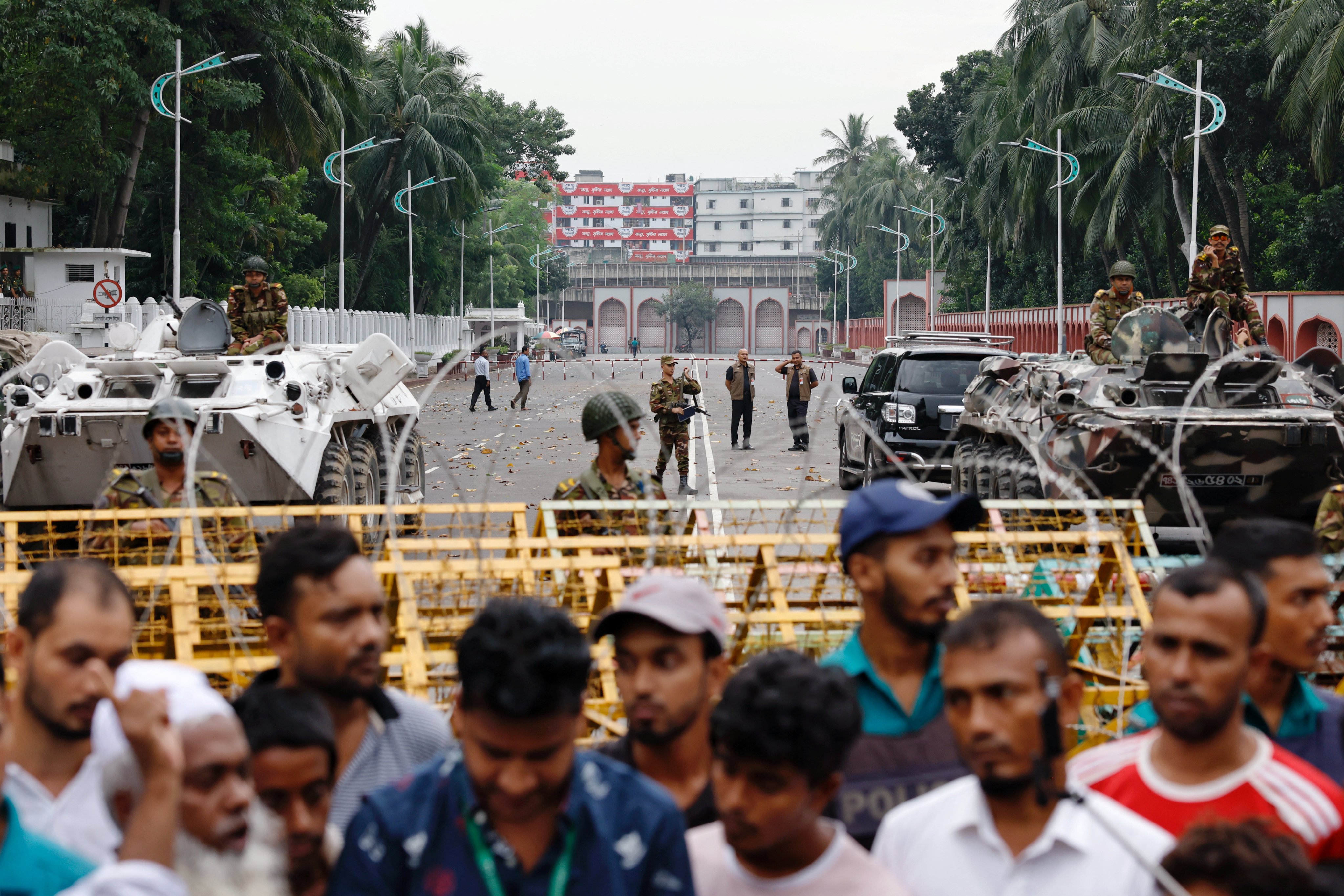 Security personnel stand guard in front of the Bangabhaban, the residence and workplace of President Mohammed Shahabuddin in Dhaka. Photo: Reuters