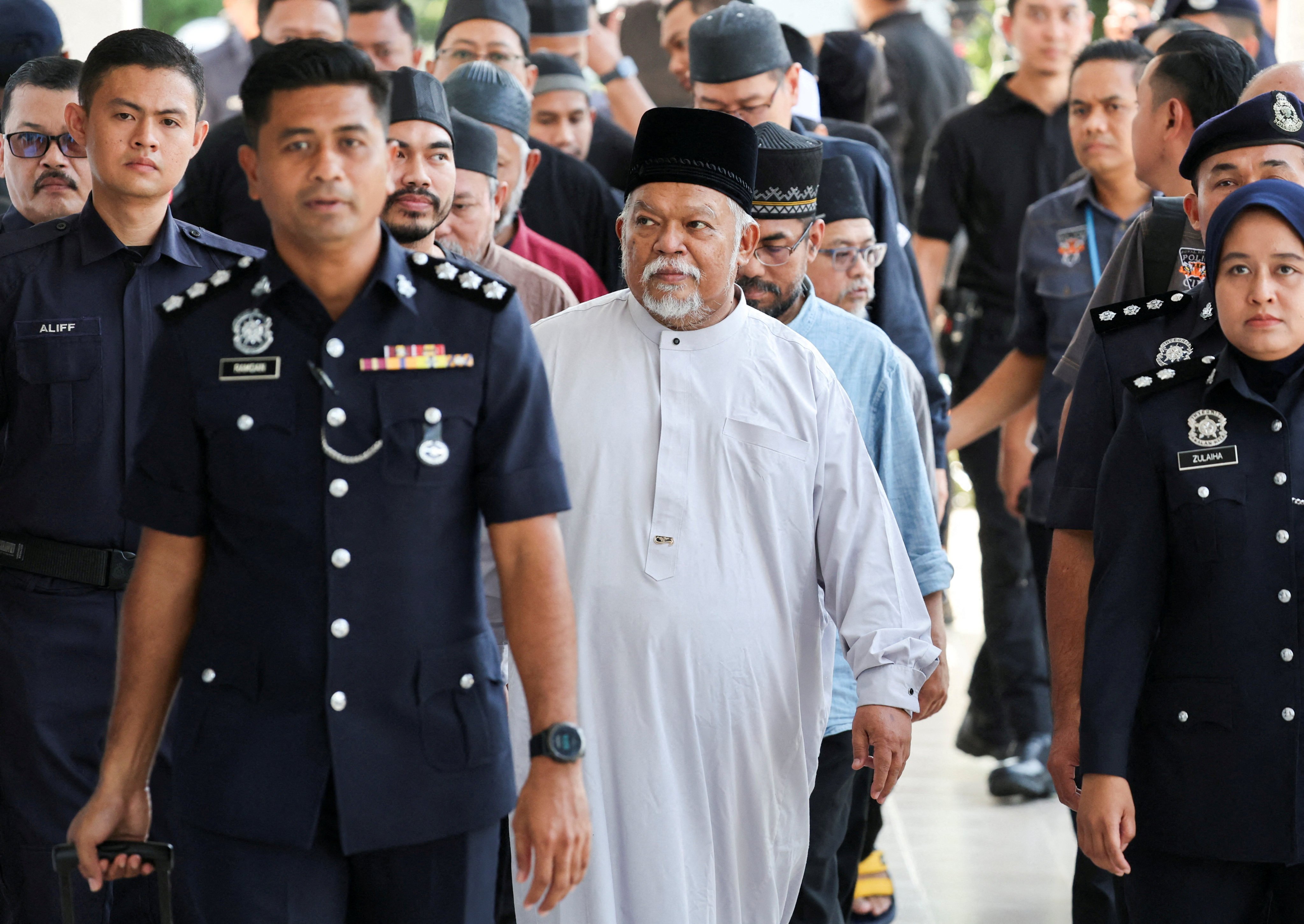 CEO of Global Ikhwan Services and Business Holdings (GISB) Nasiruddin Mohd Ali arrives at Selayang court to face charges. Photo: Reuters