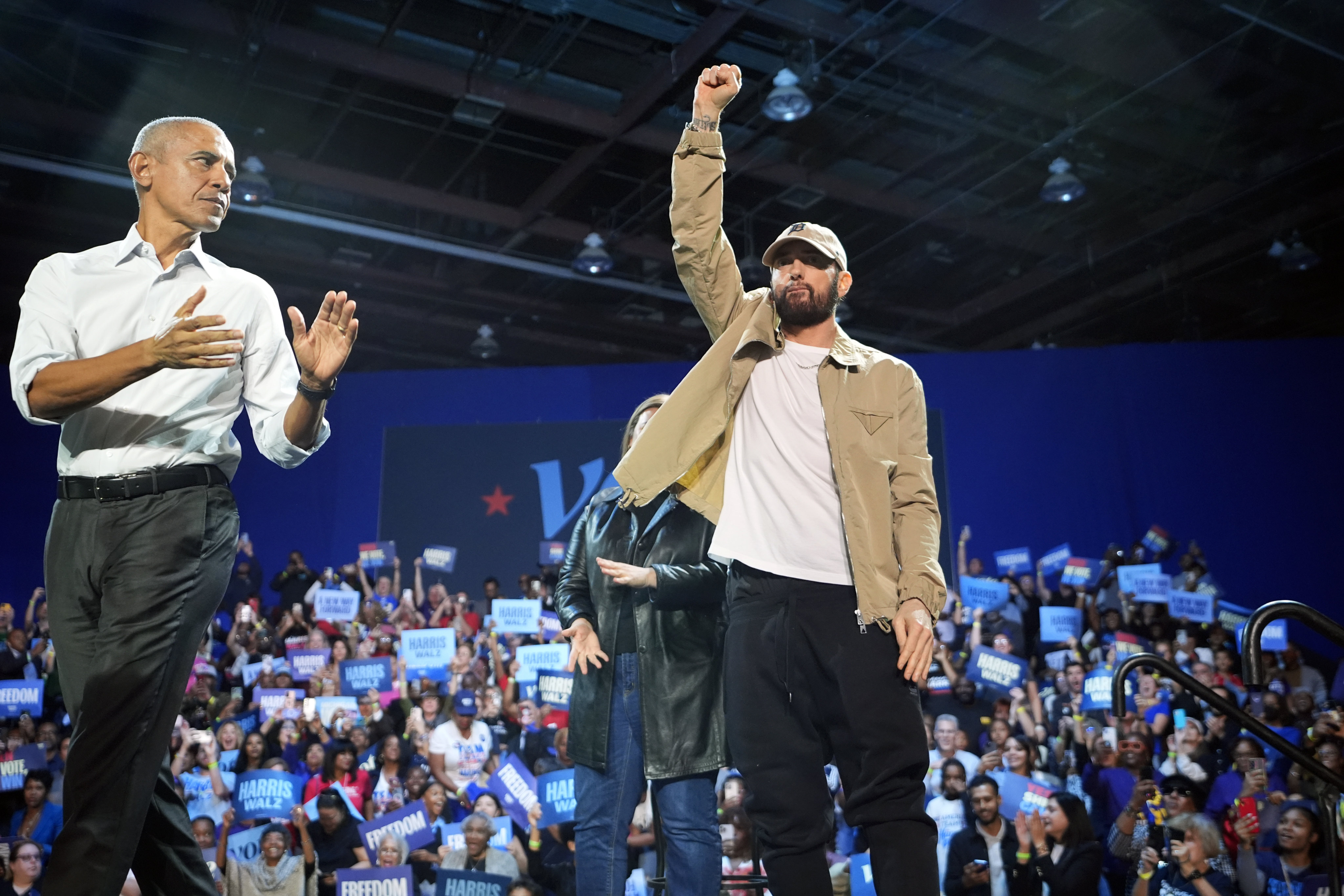 Rapper Eminem and former president Barack Obama at a campaign rally for Kamala Harris. Photo: AP