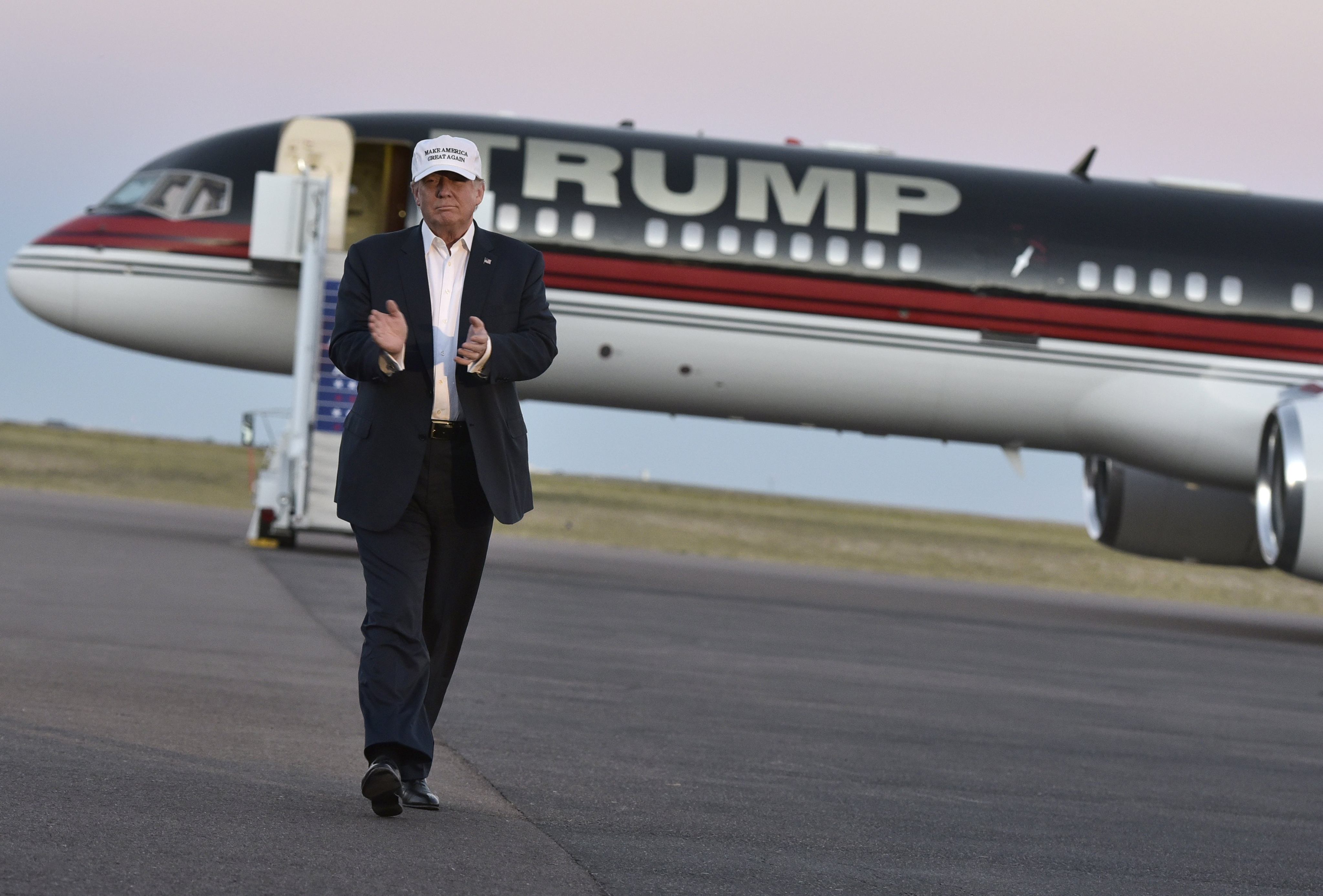 Donald Trump with his private jet, dubbed Trump Force One, in 2016. Photo: Getty Images