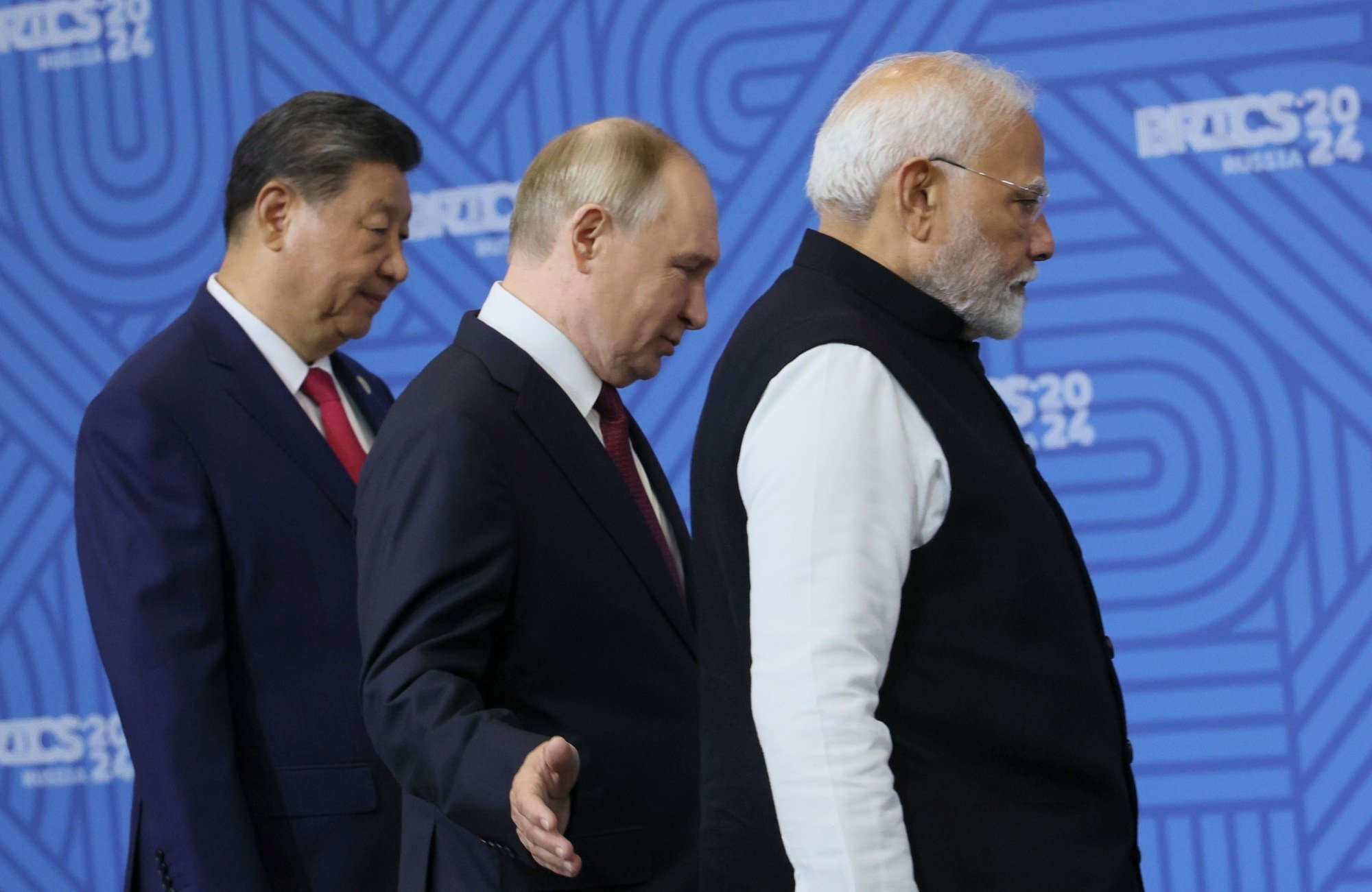 Chinese President Xi Jinping (left), Russian President Vladimir Putin and Indian Prime Minister Narendra Modi take part in a photo ceremony before a Brics summit plenary session in Kazan, Russia, on Wednesday. Photo: AP