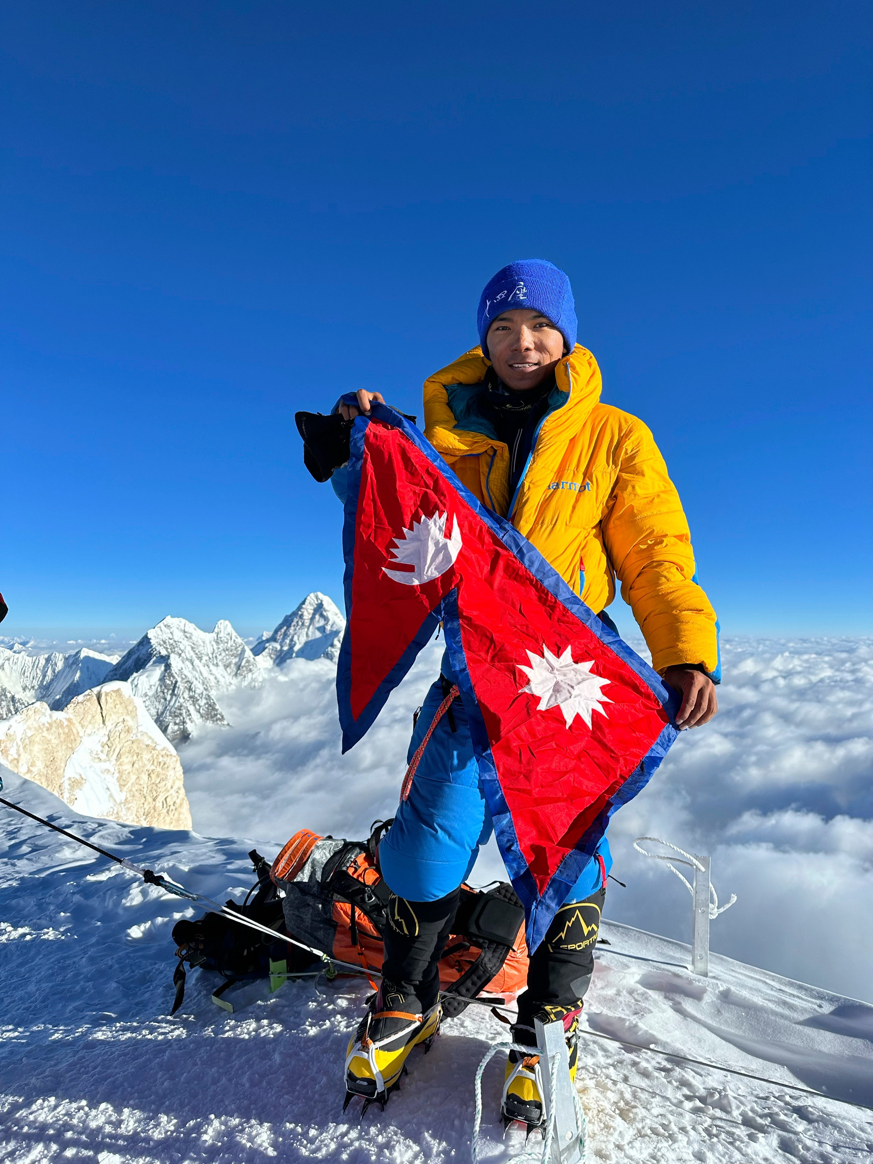 Nima Rinji Sherpa pictured on top of G2 mountain in Pakistan in July last year. Photo: AP