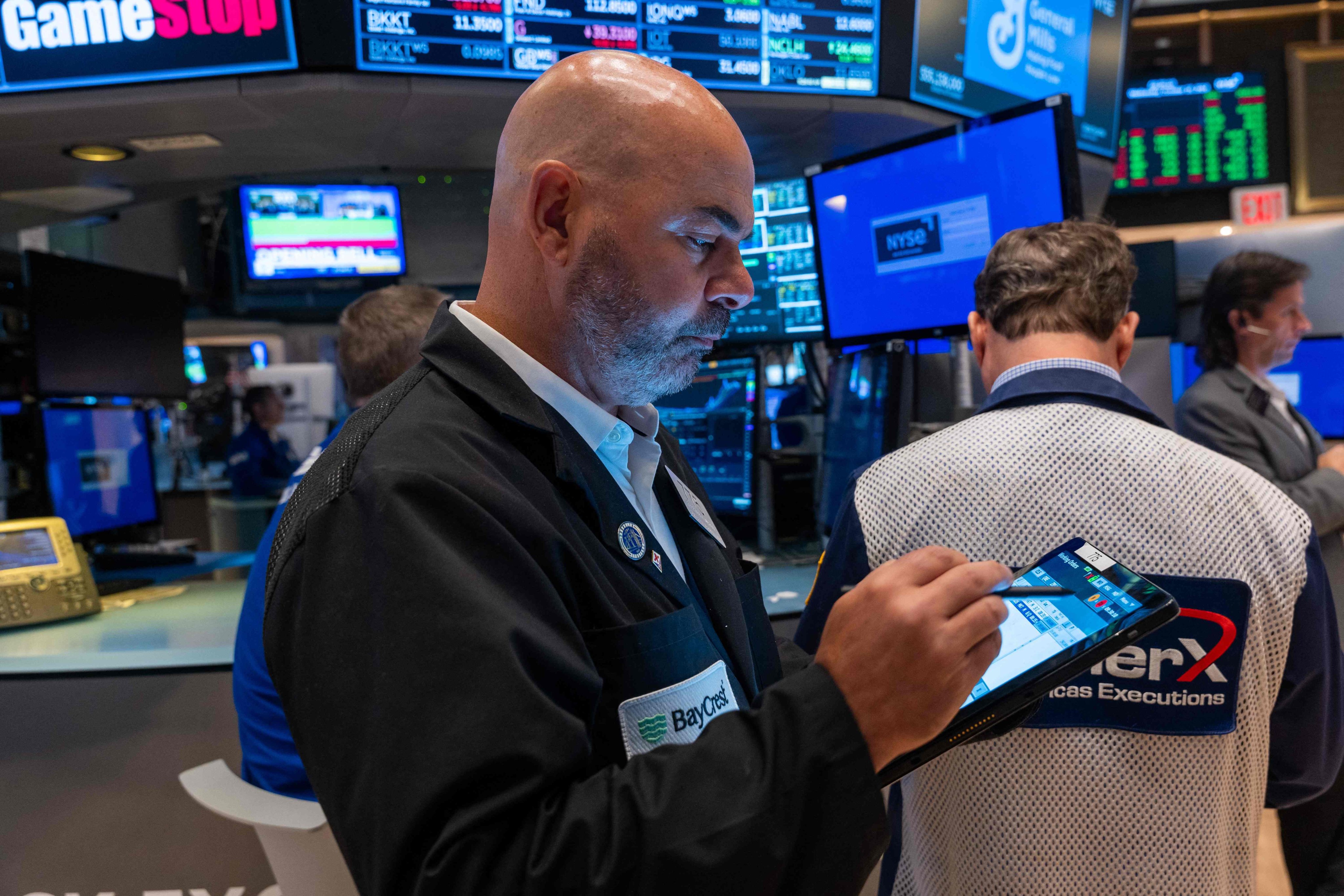 Traders work on the New York Stock Exchange floor on October 16. Photo: Getty Images / AFP