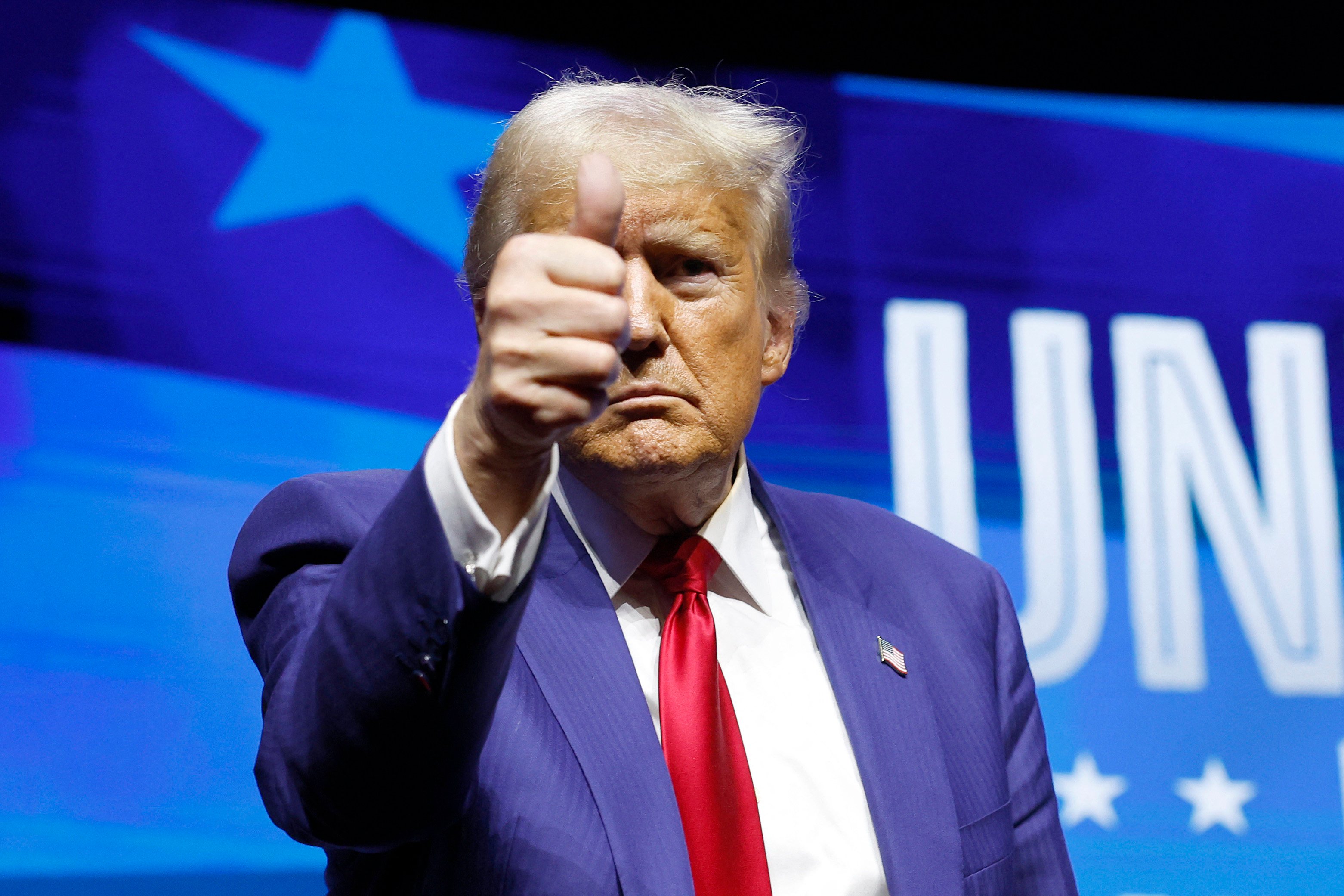 Republican presidential nominee, former US president Donald Trump, departs after speaking at a campaign rally on Thursday in Las Vegas. Photo: Getty Images via AFP