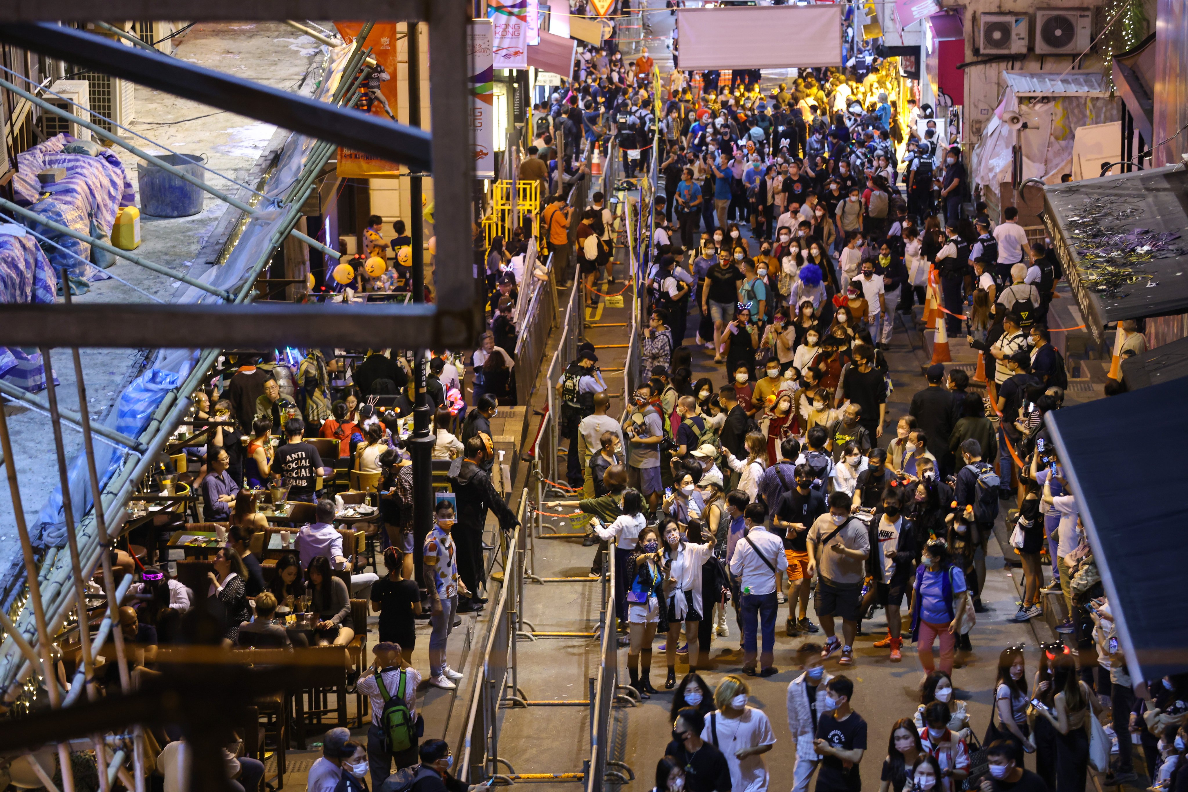 Crowds celebrate Halloween in Hong Kong’s party hub Lan Kwai Fong in 2022. Photo: Jonathan Wong