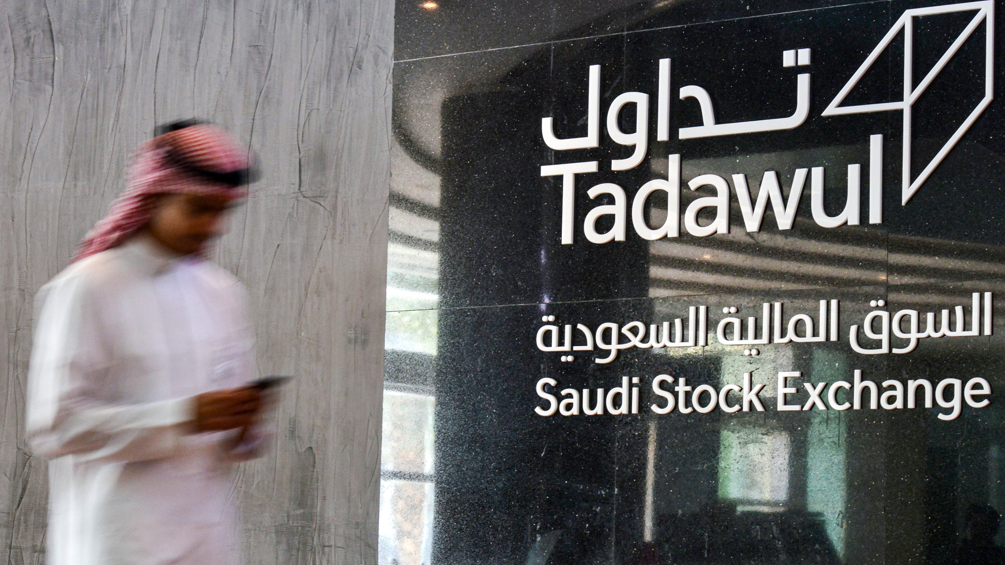 This picture taken December 12, 2019 shows the sign and logo of Saudi Arabia’s Stock Exchange Market (Tadawul) in the capital Riyadh.  Photo: AFP