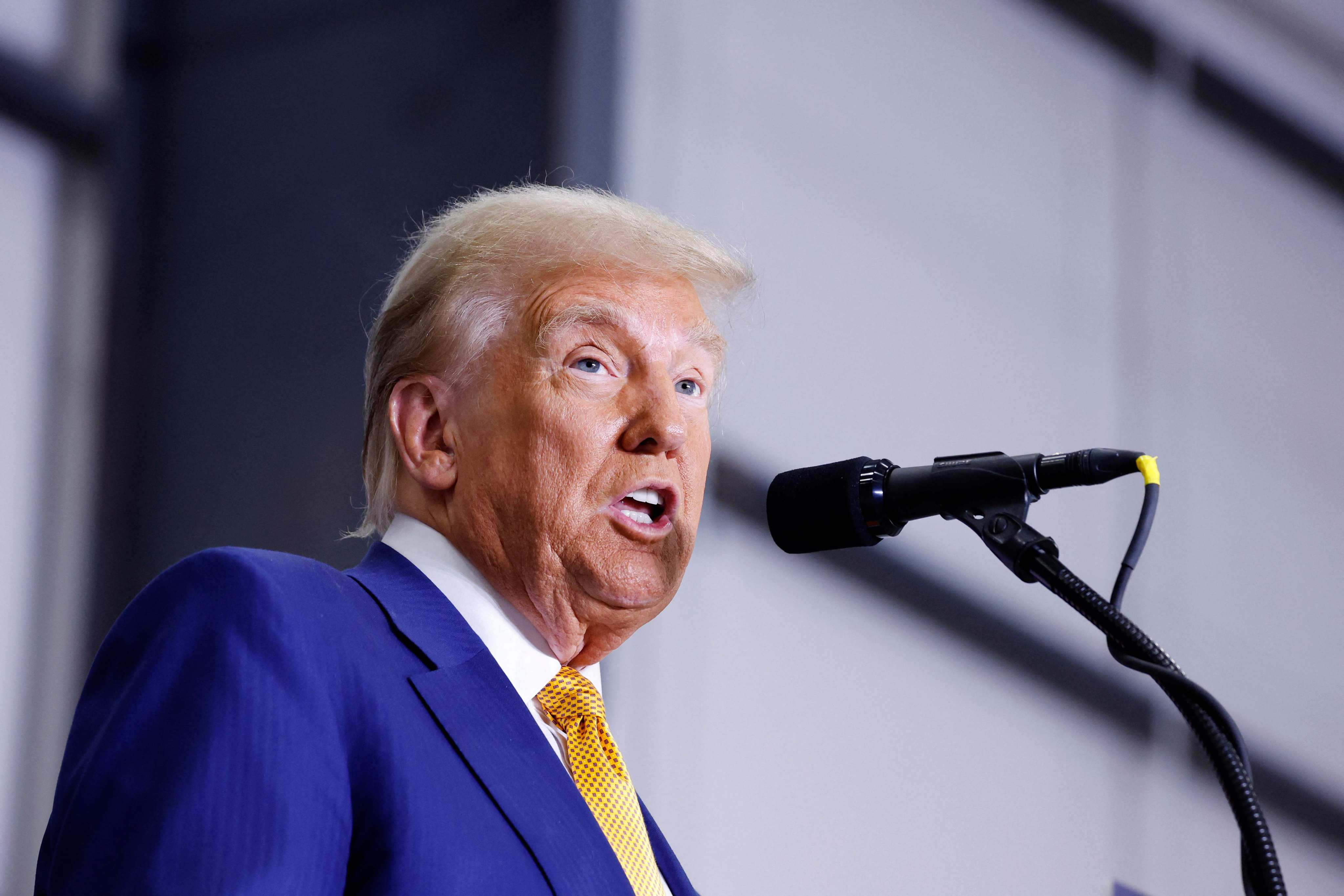 Republican US presidential nominee Donald Trump gives remarks on border security inside an airplane hanger at the Austin-Bergstrom International Airport in Texas on Friday. Photo: AFP