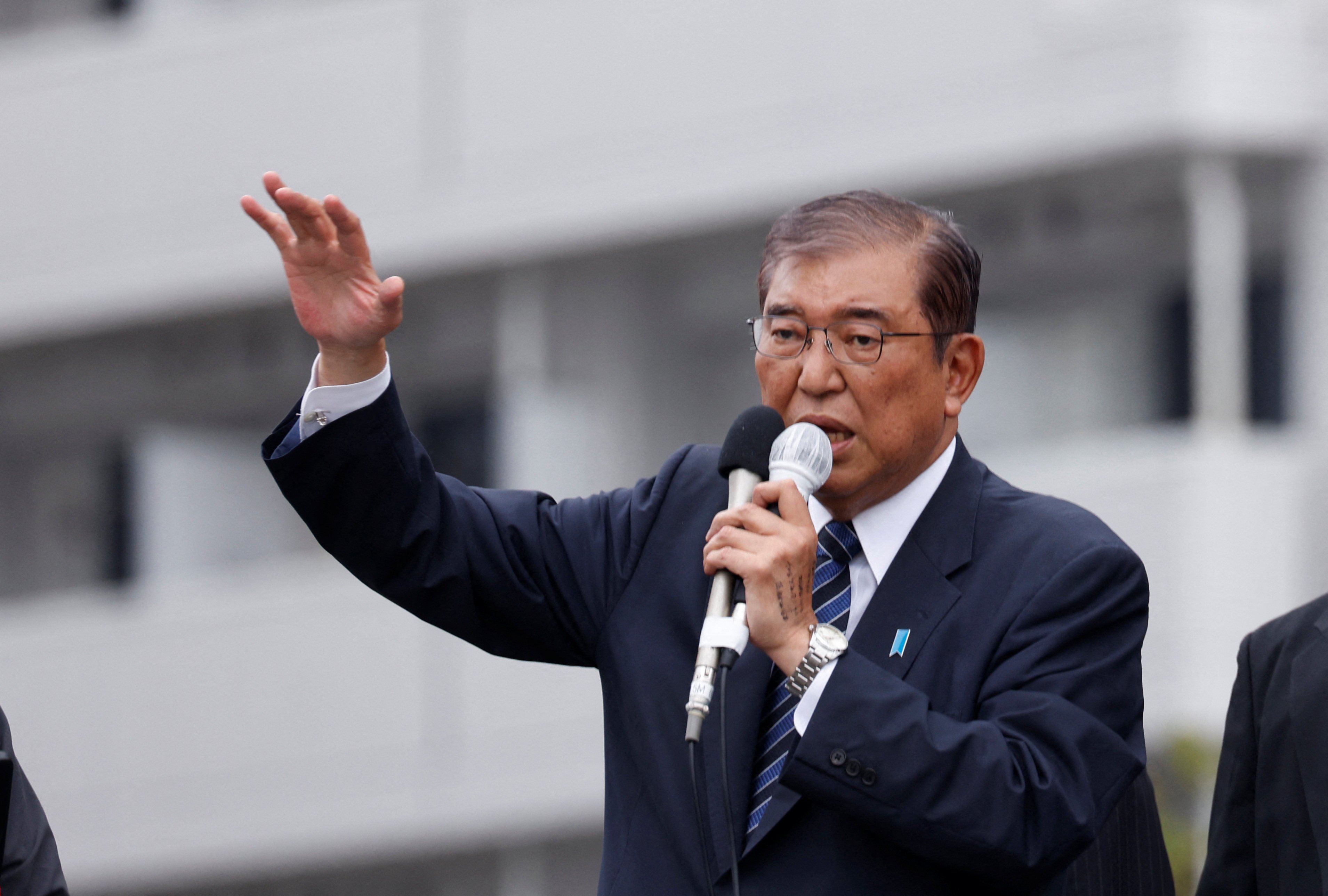 Japan’s Prime Minister Shigeru Ishiba, leader of the Liberal Democratic Party, speaks at a campaign for the general election in Tokyo on Saturday. Photo: Reuters