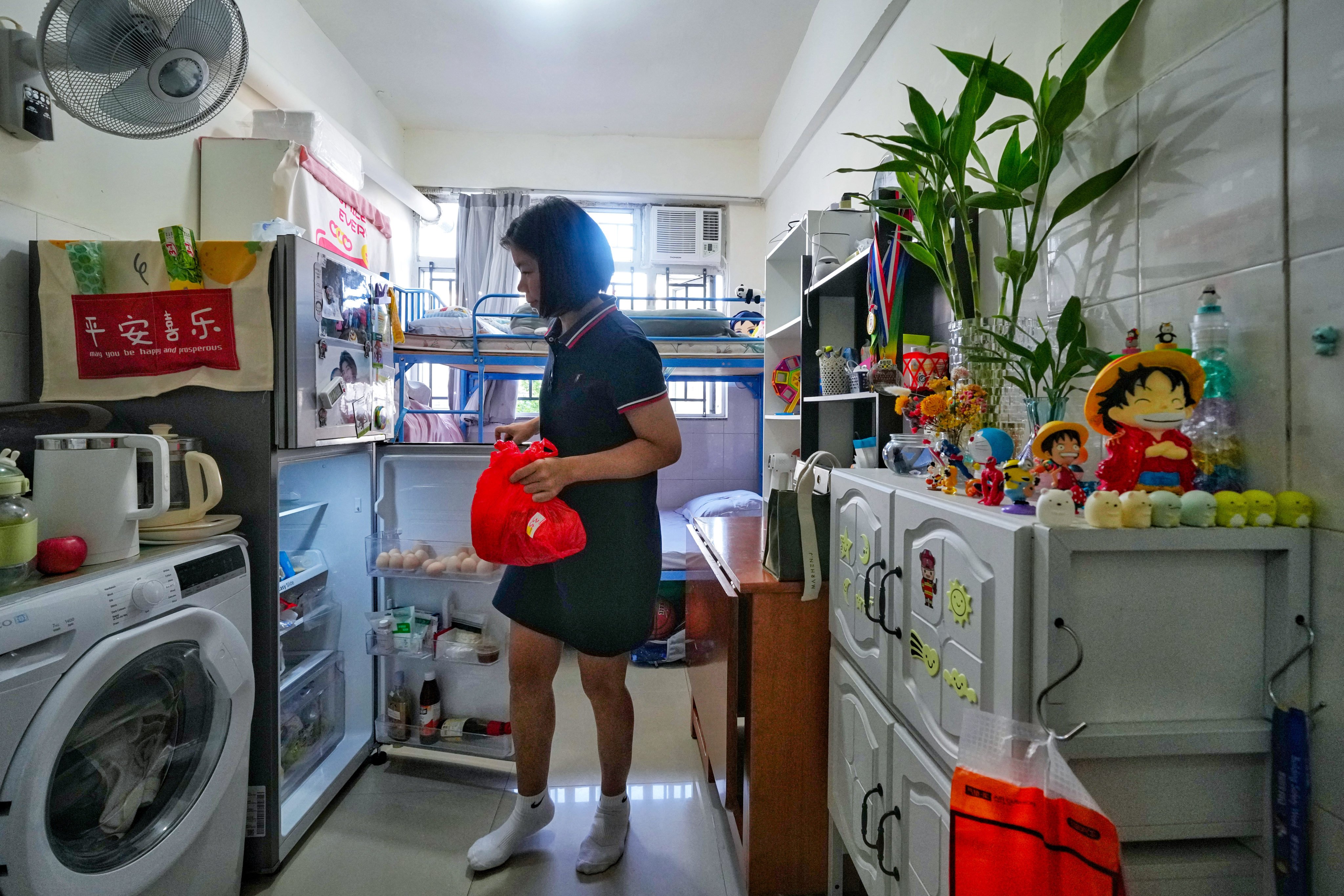 Sherry Deng says she is happy to have secured a more spacious subdivided flat in Tsuen Wan. Photo: Elson Li