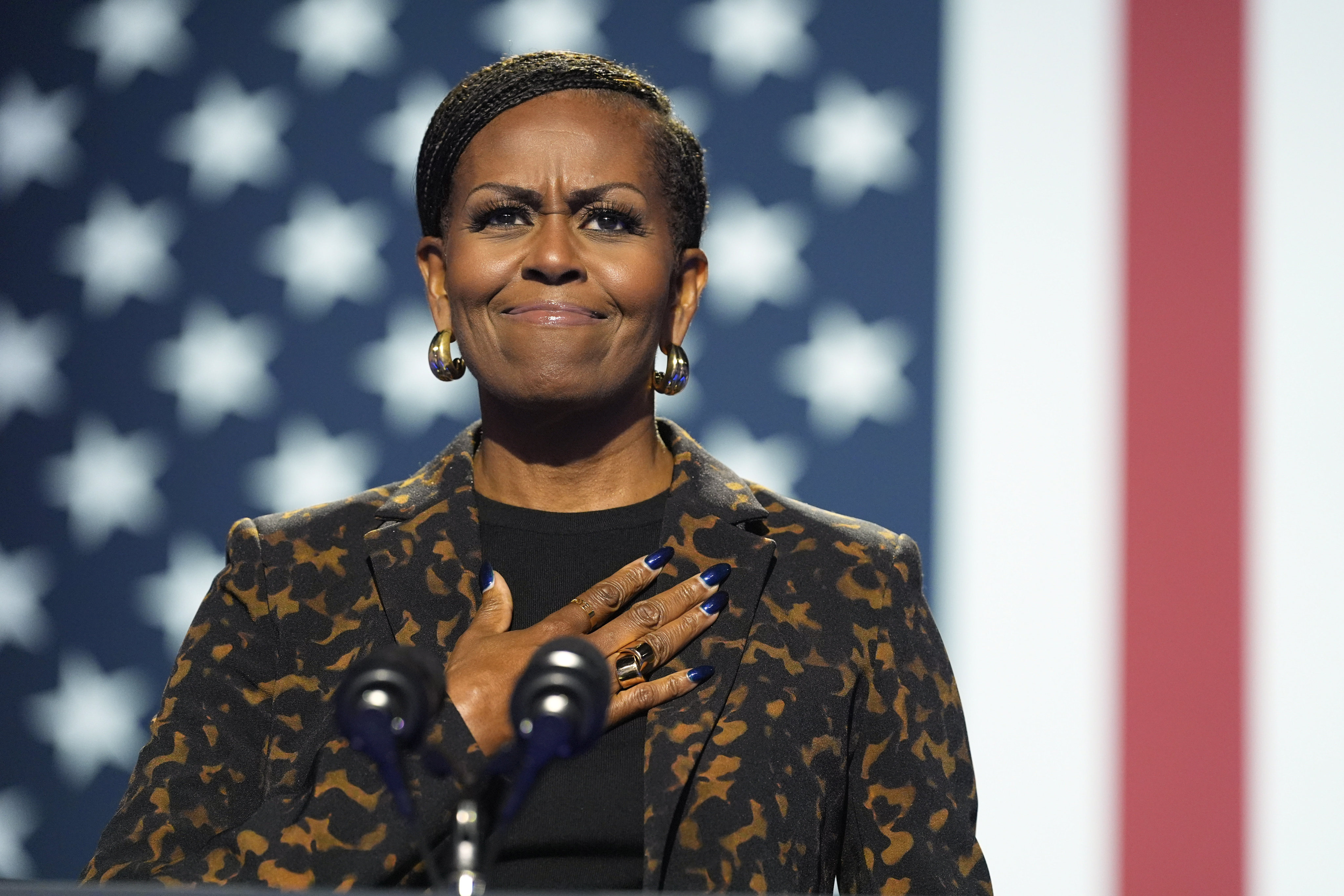 Former first lady Michelle Obama speaks at a campaign rally for democratic presidential nominee Vice President Kamala Harris at the Wings Event Center, in Kalamazoo, Mich., Saturday, Oct. 26, 2024.(AP Photo/Jacquelyn Martin)