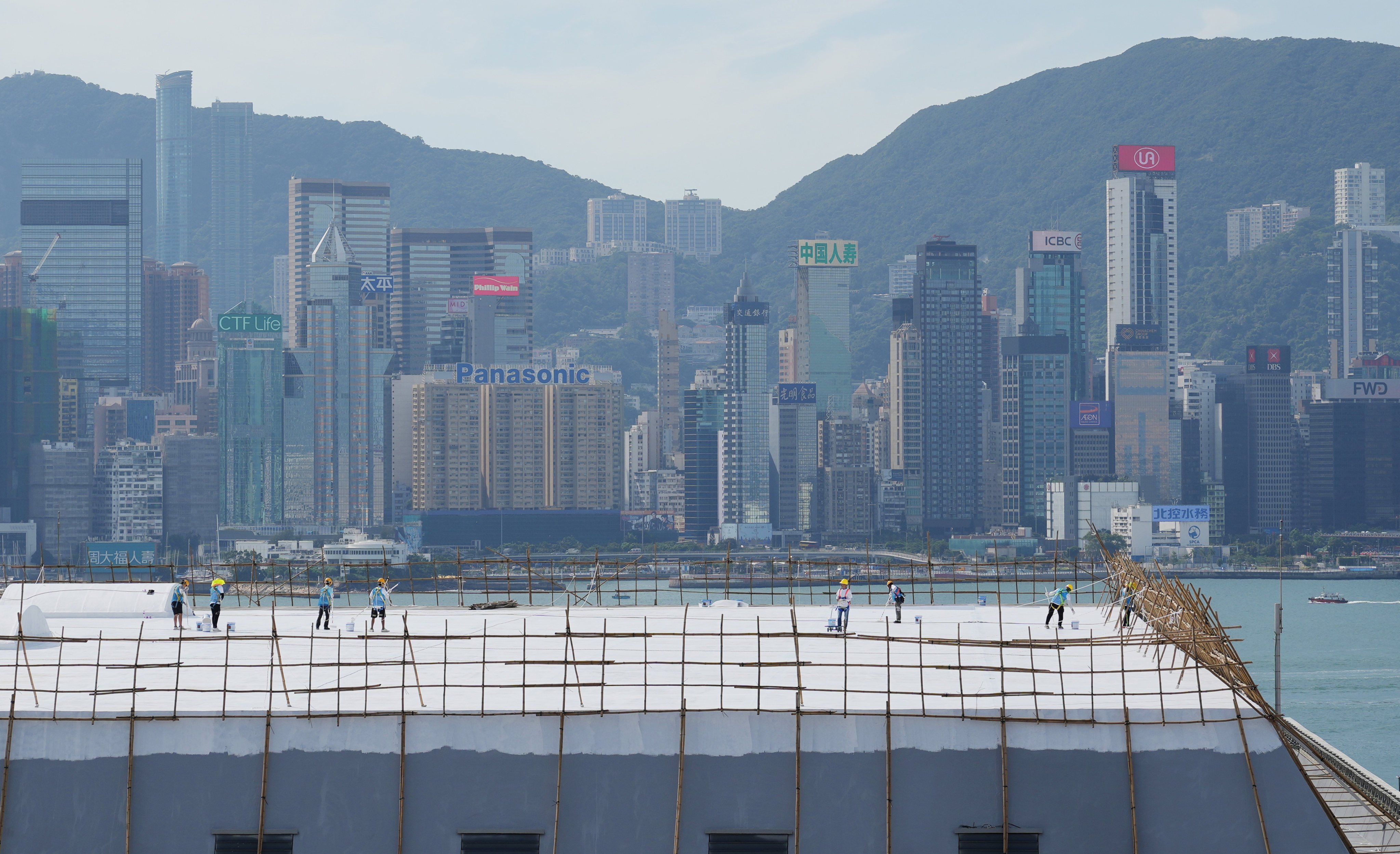 Worker carrying out essential maintenance on the rooftop of the Hong Kong Coliseum in Hung Hom on October 24. Photo: May Tse 