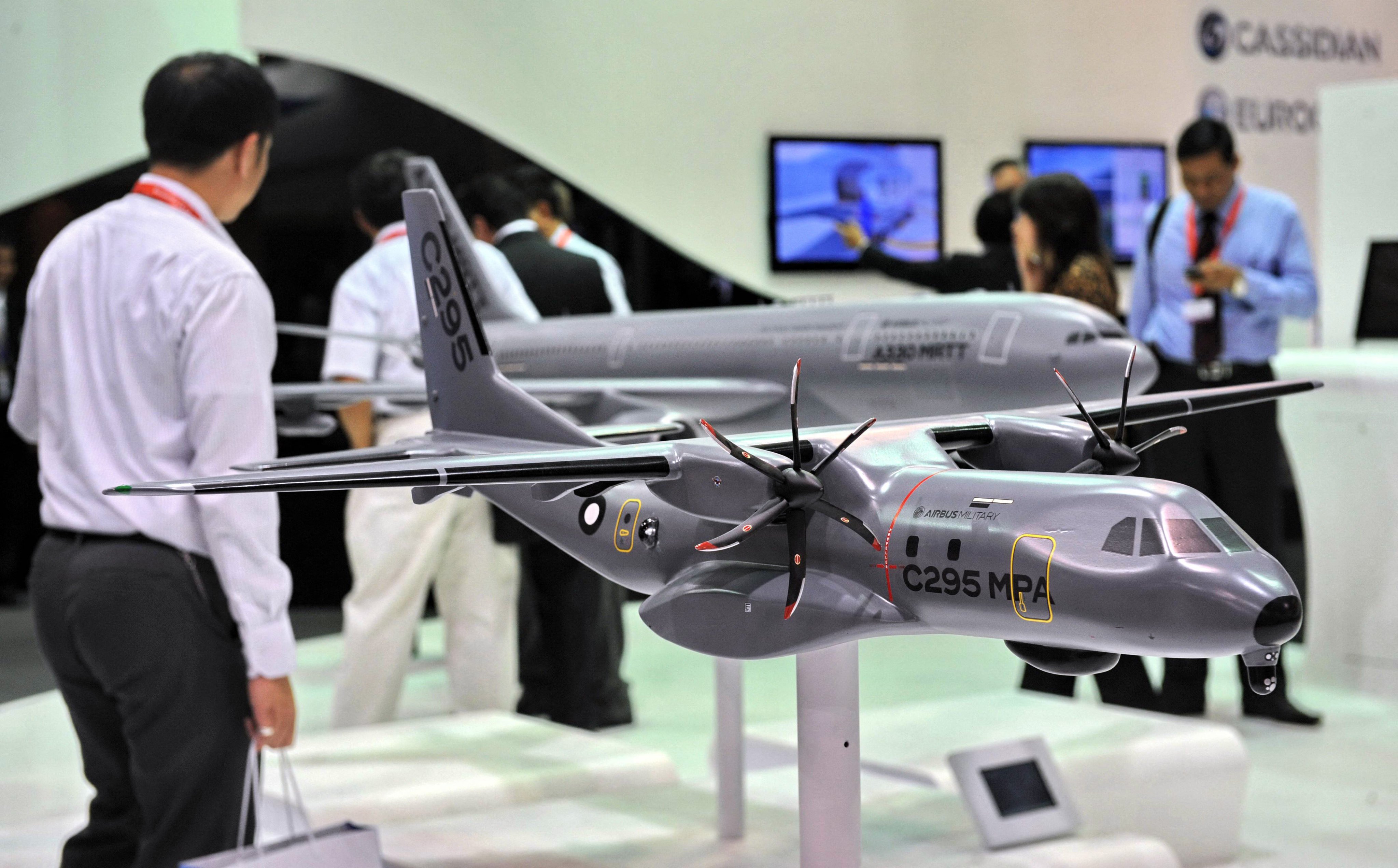 A model of an Airbus C-295 military transport plane is exhibited at the Singapore Airshow in 2012. Photo: AFP