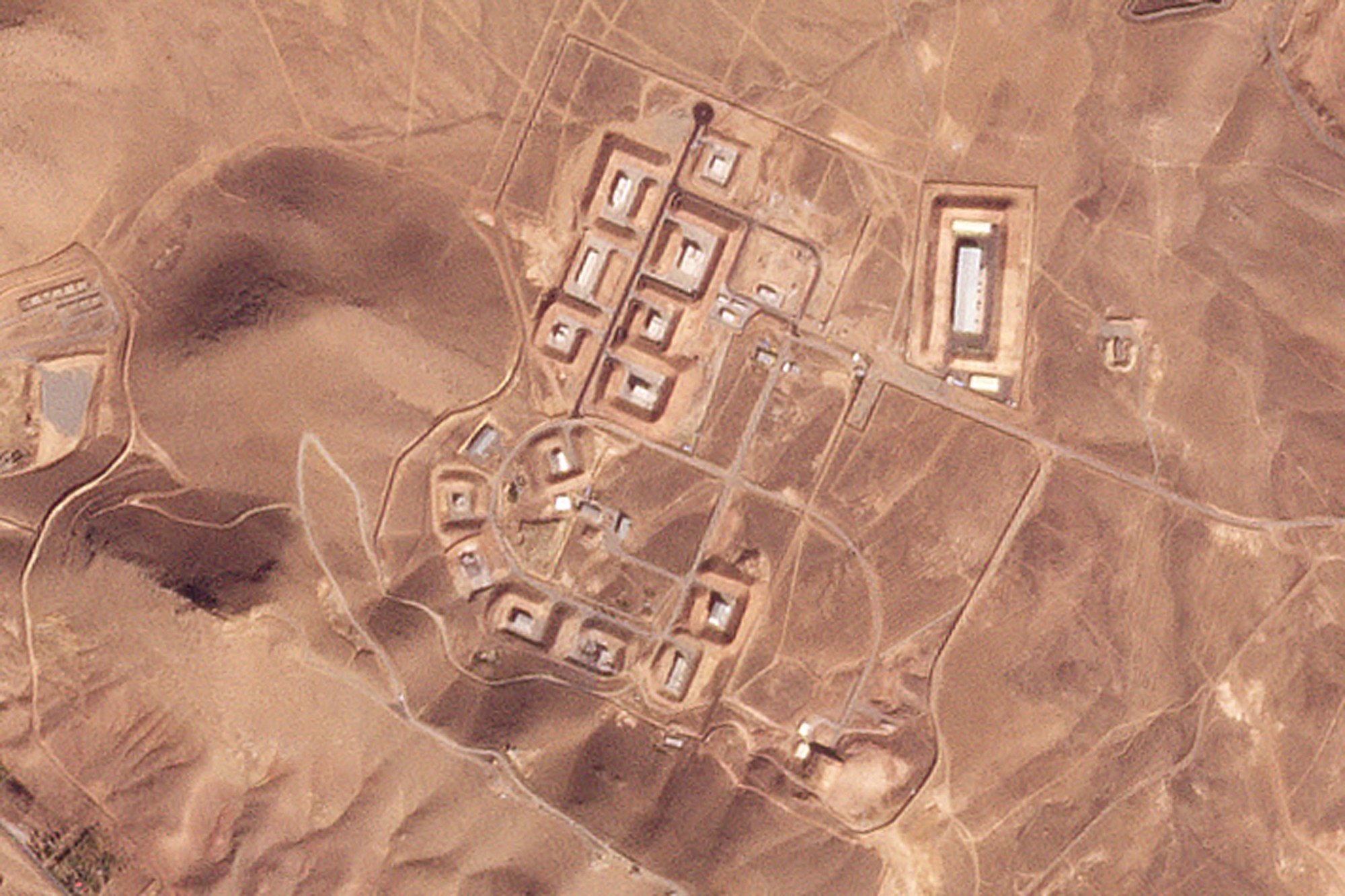 A satellite photo shows damaged buildings at Iran’s Khojir military base outside Tehran on Saturday. Photo: Planet Labs PBC via AP