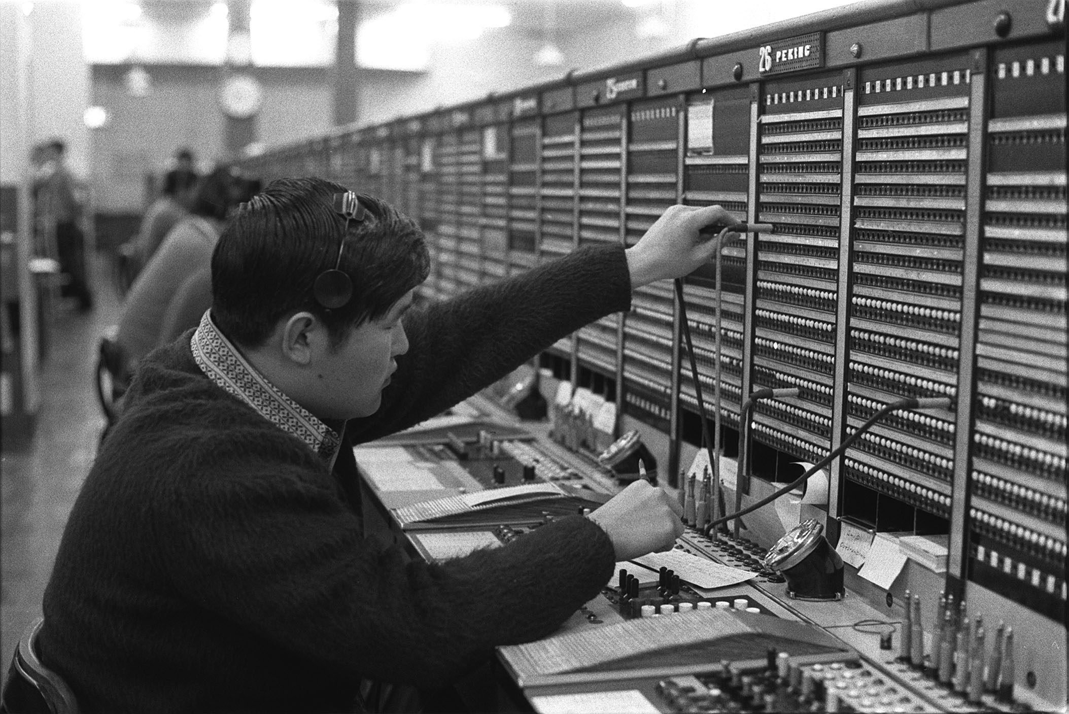 A telephone operator transfers a call from Hong Kong to mainland China in 1972. Photo: SCMP Archive