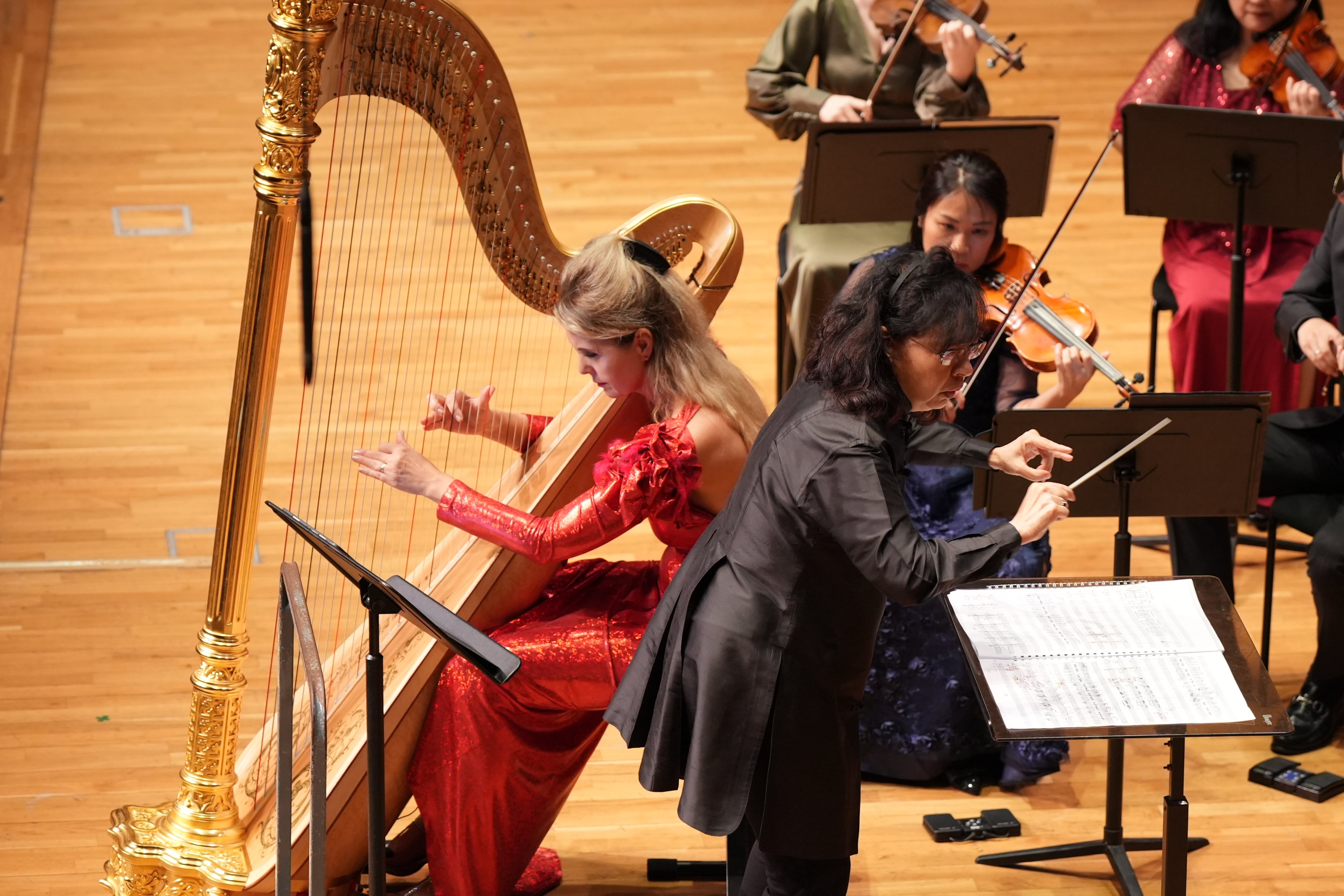 Harpist Katerina Englichova and the City Chamber Orchestra of Hong Kong under conductor Sharon Choa perform a work by Zdenek Lucas, part of an evening of mainly Czech music. Photo: City Chamber Orchestra of Hong Kong