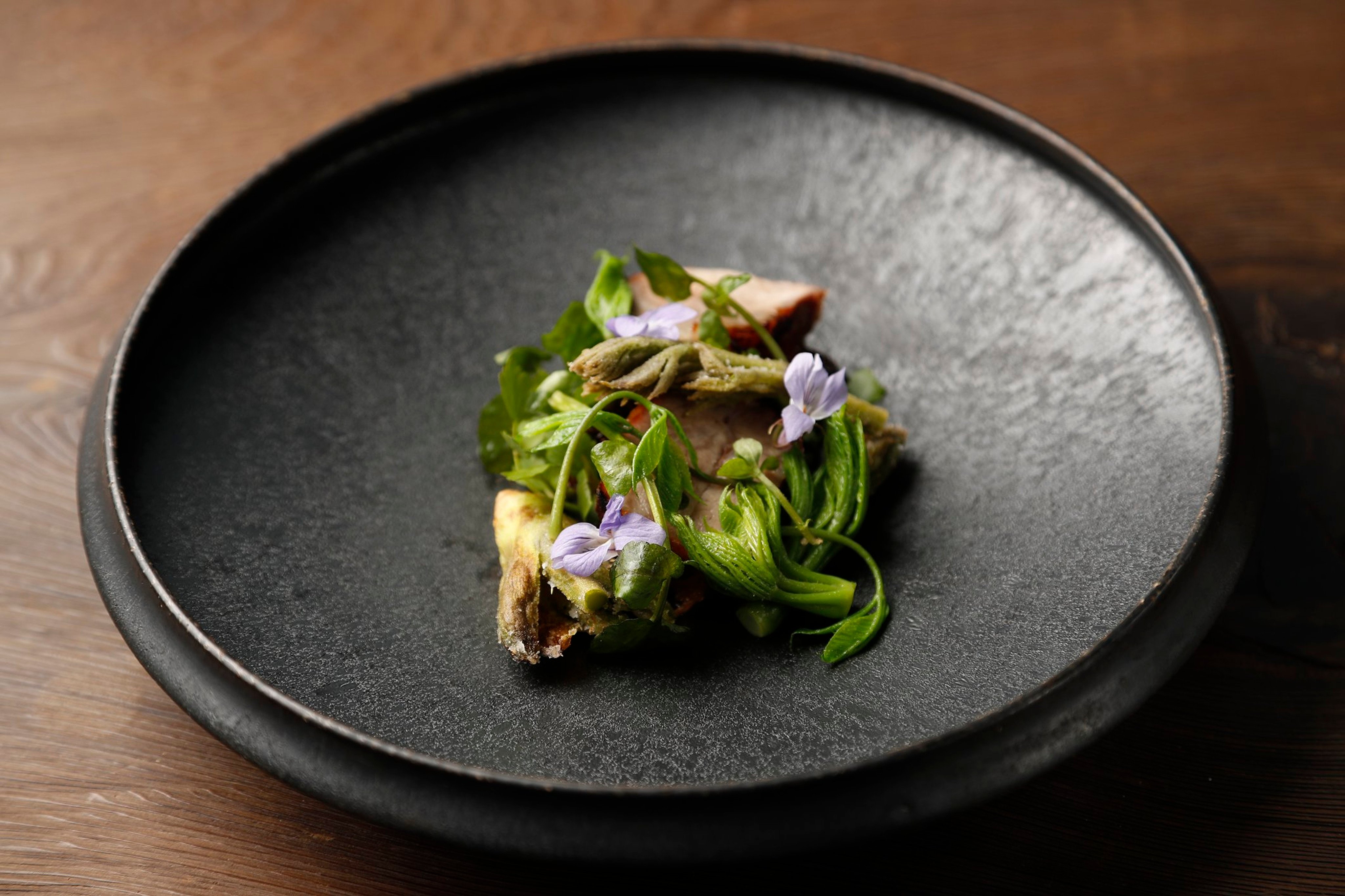 A dish at Uozen in Sanjo city, in Japan’s Niigata prefecture, where chef Kazuhiro Inoue takes a hands-on approach to sourcing ingredients, including cultivating his own vegetables and hunting game in the mountains. Photo: Uozen