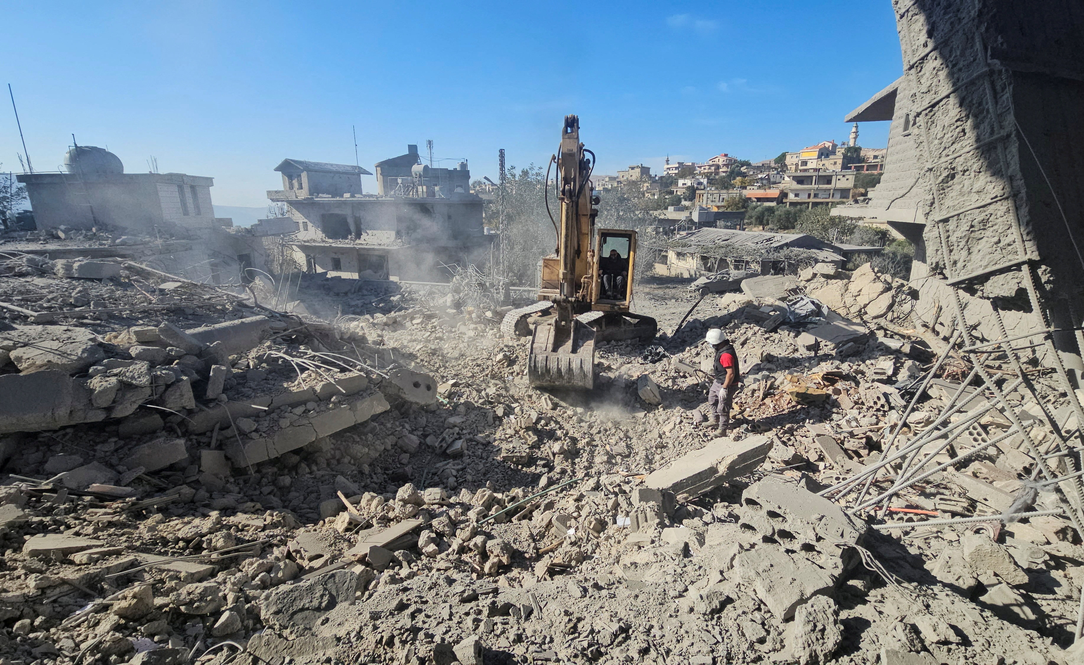 Rescuers work at a site damaged by Israeli strikes in Yohmor, in Lebanon’s Bekaa Valley. Photo: Reuters