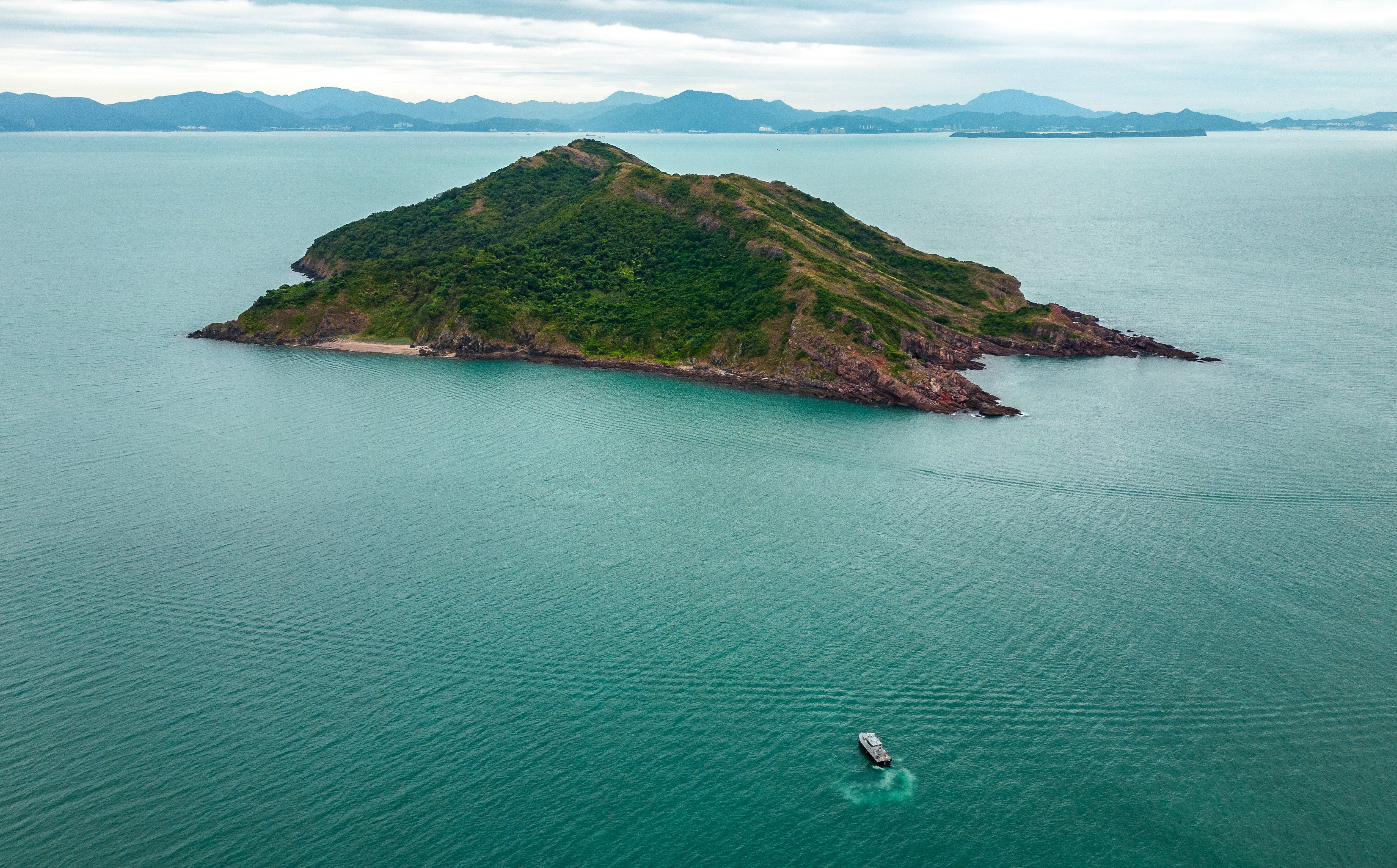 Port Island is currently sealed off for further geological investigation after the recent discovery of dinosaur fossils for the first time in Hong Kong. Photo: Eugene Lee