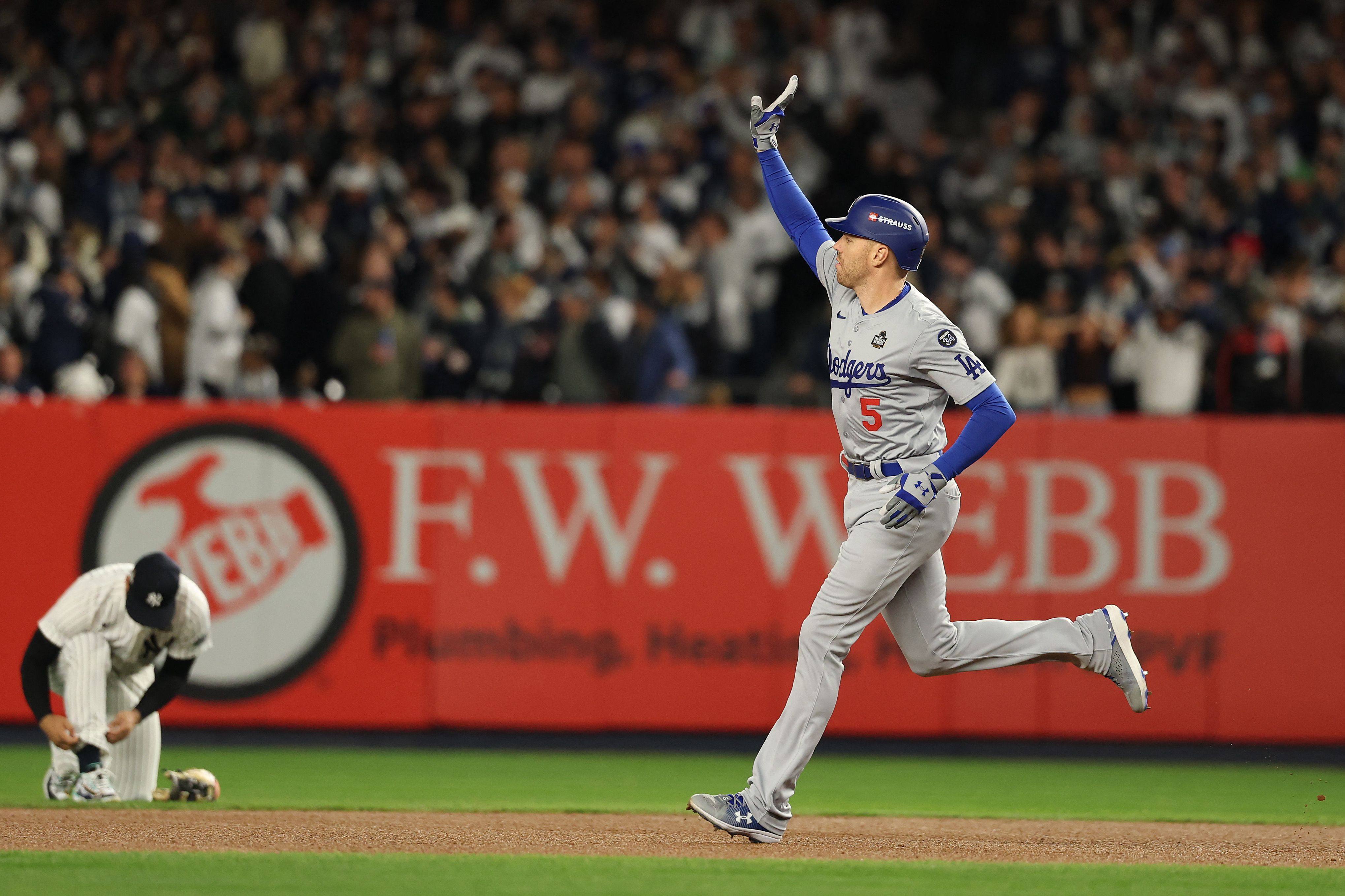 Freddie Freeman rounds the bases after hitting a two-run homer against the New York Yankees in the first inning of Game 3. Photo: AFP