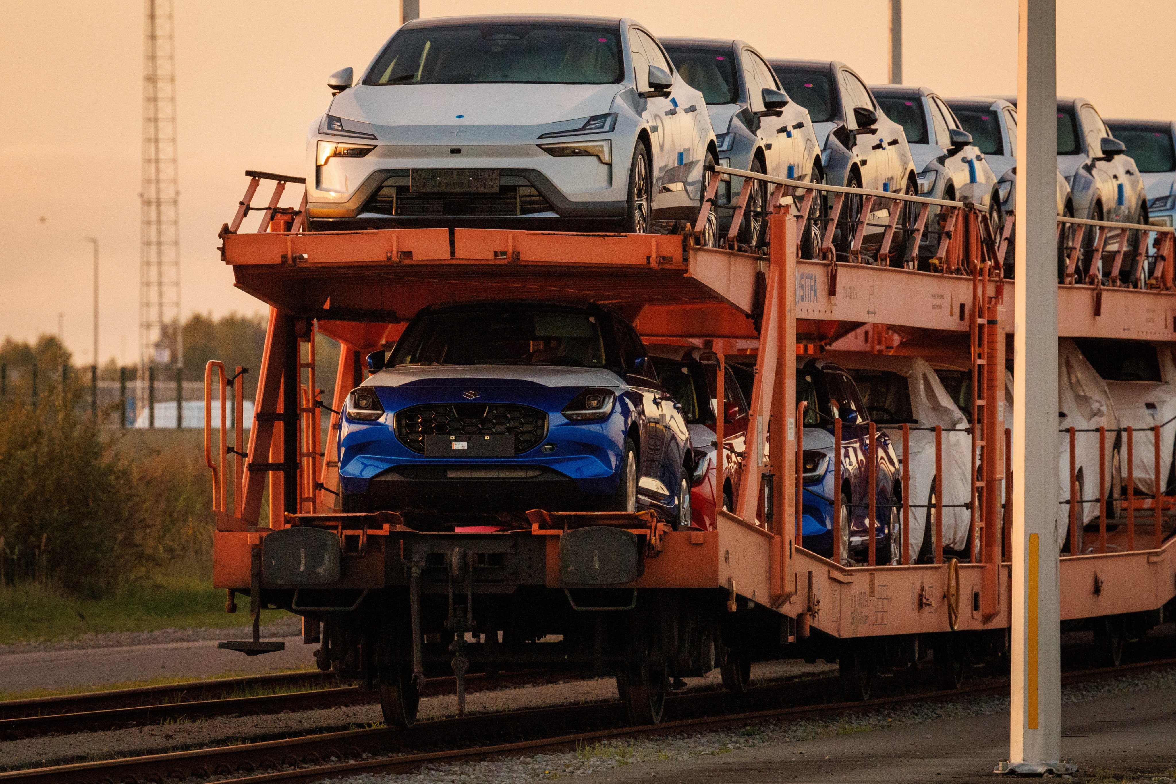 Cars on a transport train parked at ICO International Car Operators inlet terminals at a port in Zeebrugge, Belgium. Photo: EPA-EFE